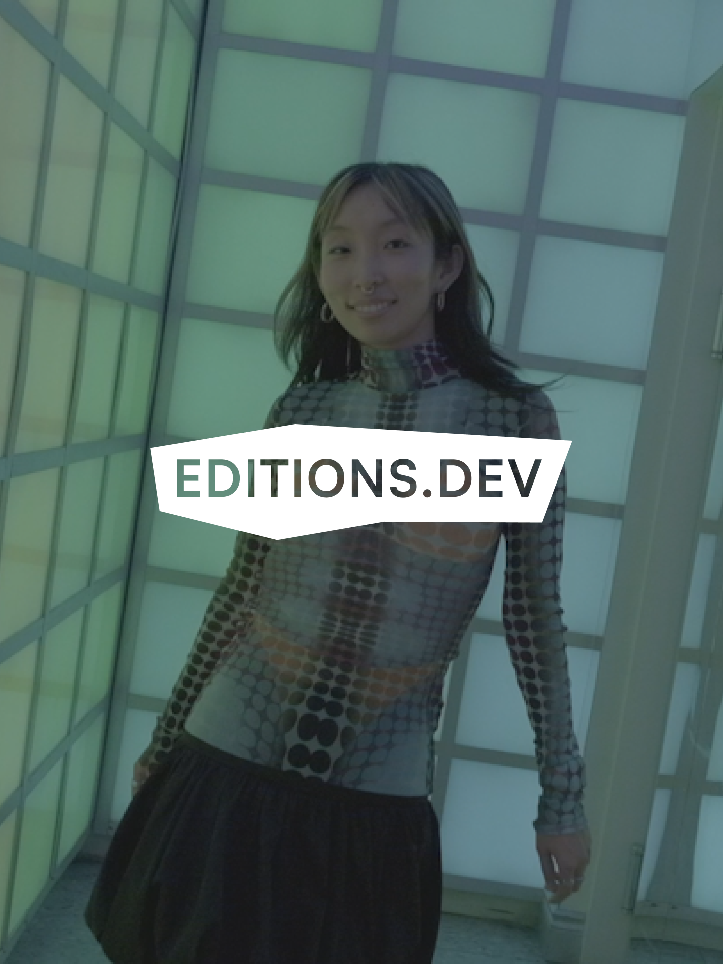 Shopify Editions logo and Shopify Editions.dev logo superimposed on an image of a disco ball.