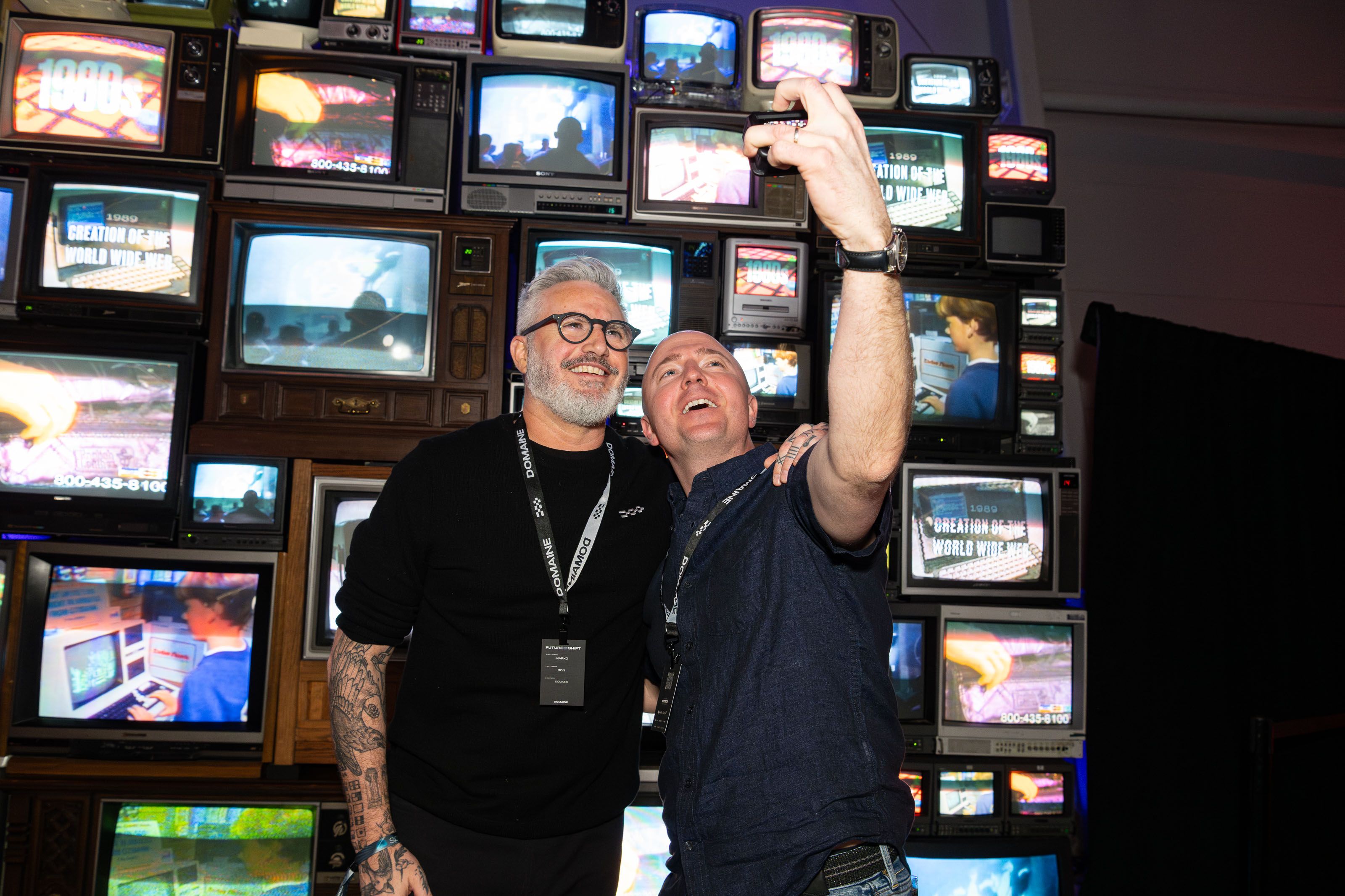 Guest in front of TV wall at Futureshift
