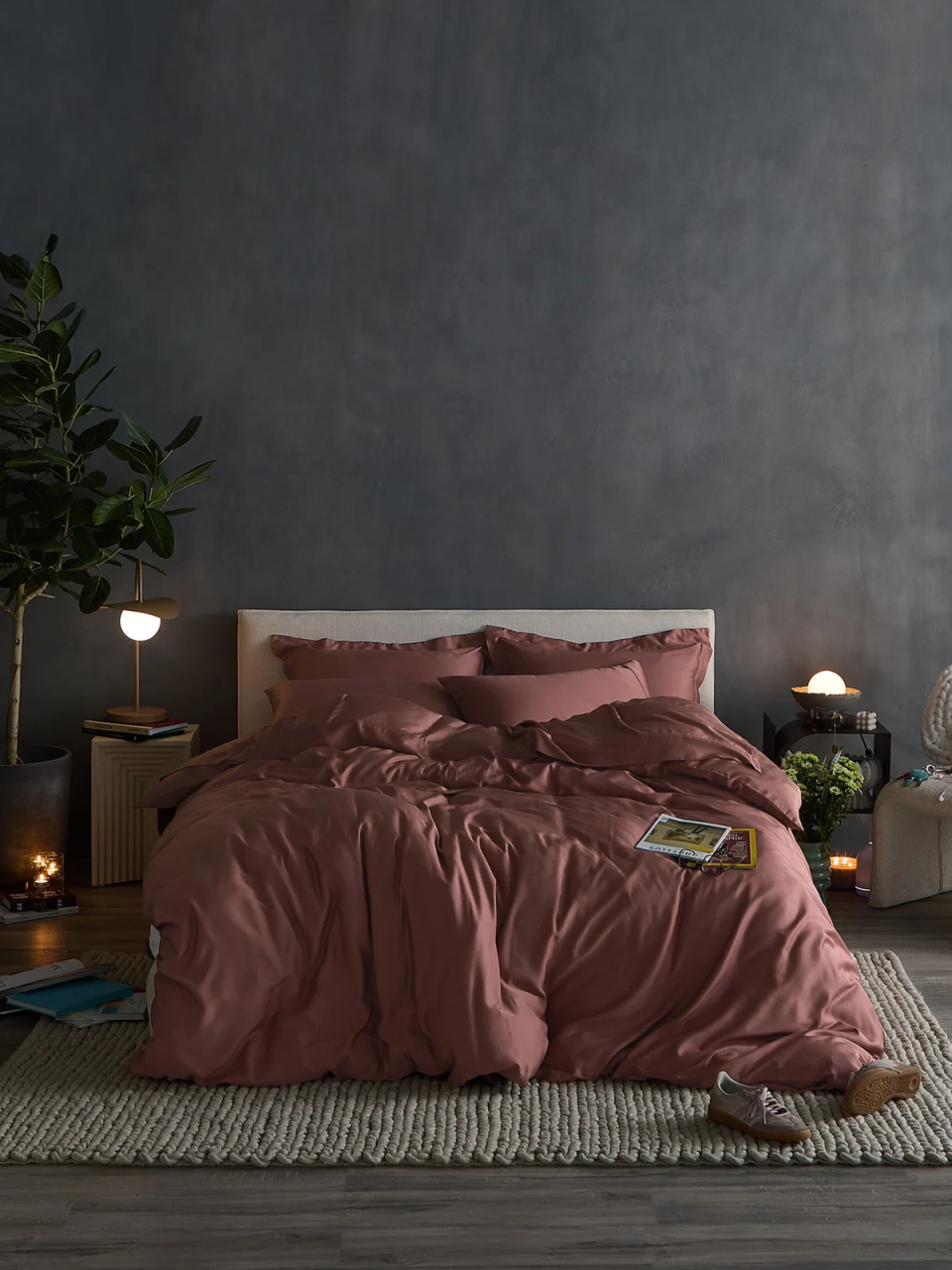 Image of a bed with a grey background