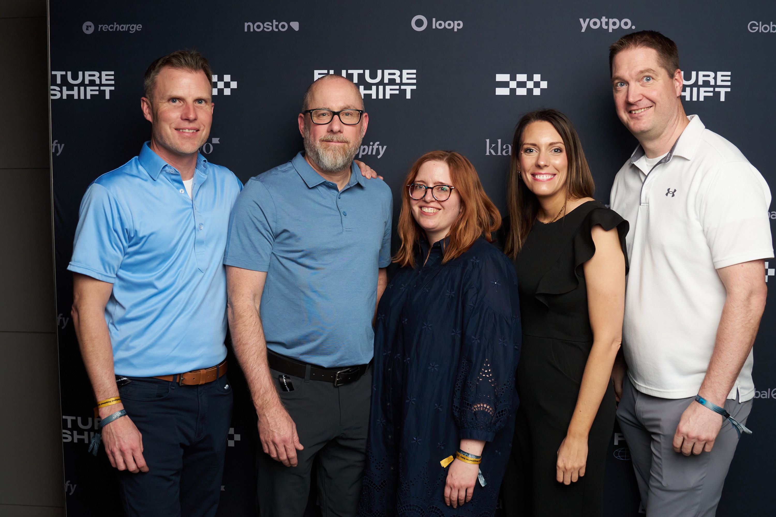 Guests in front of our step & repeat