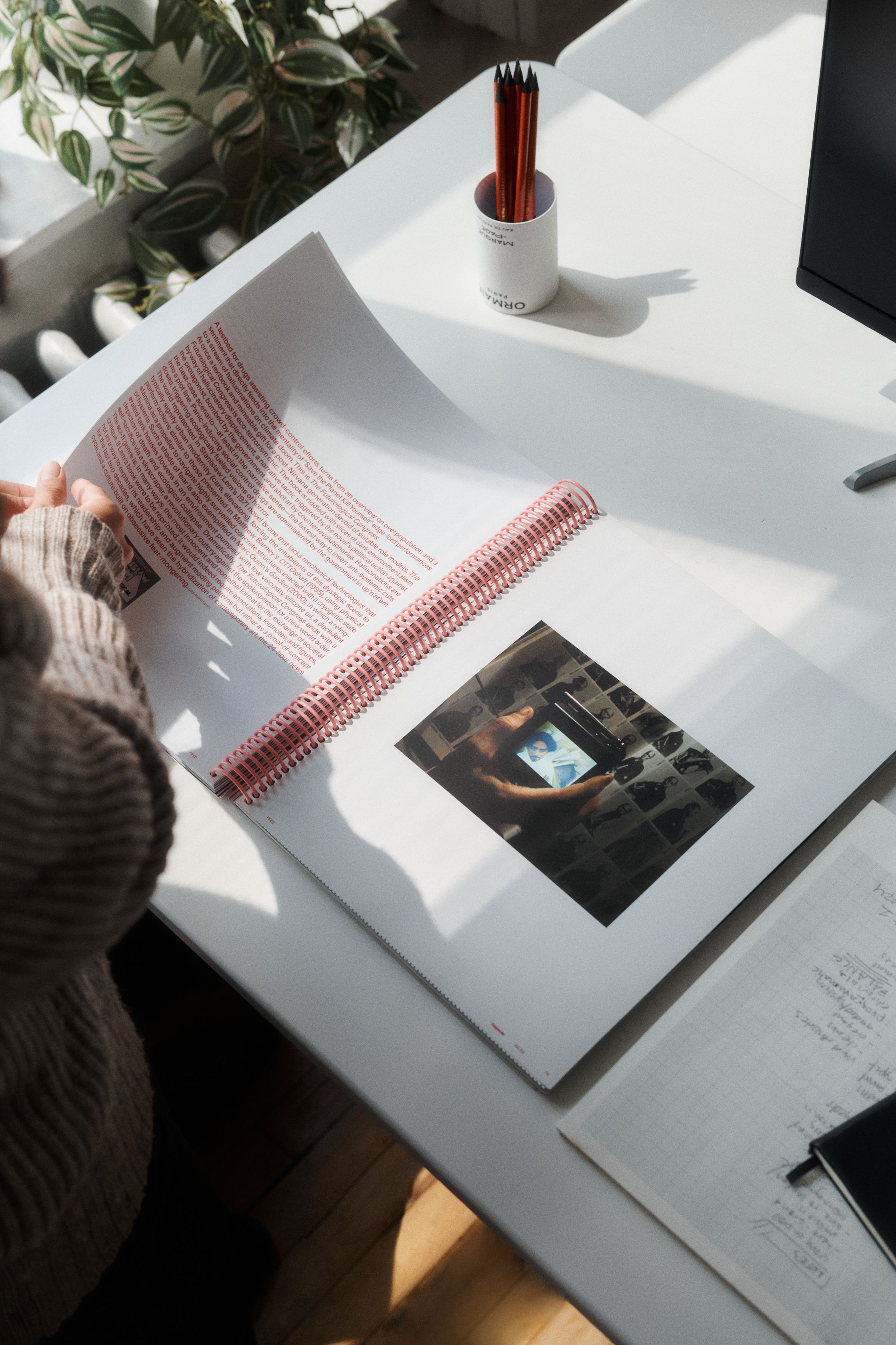 Flipping through brand book