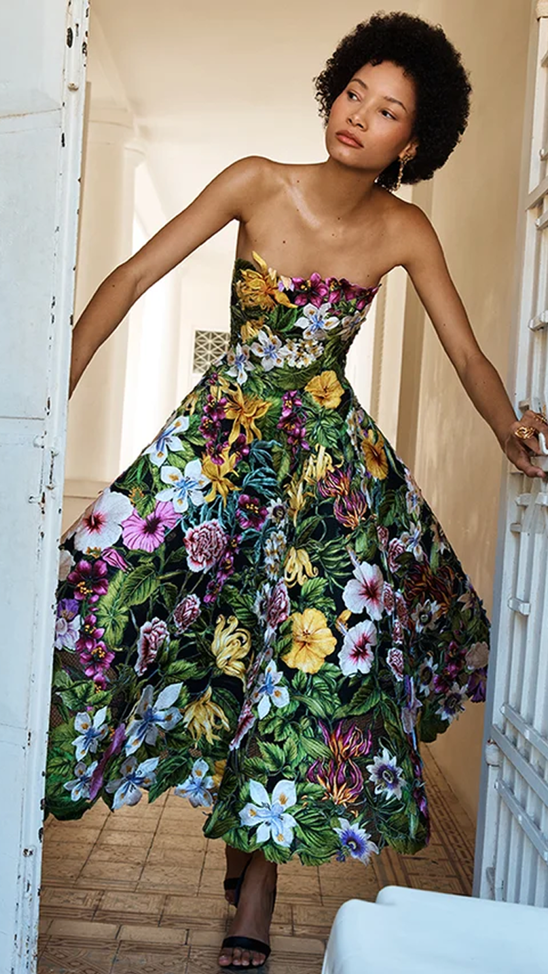 Women in green dress with a lot of flowers