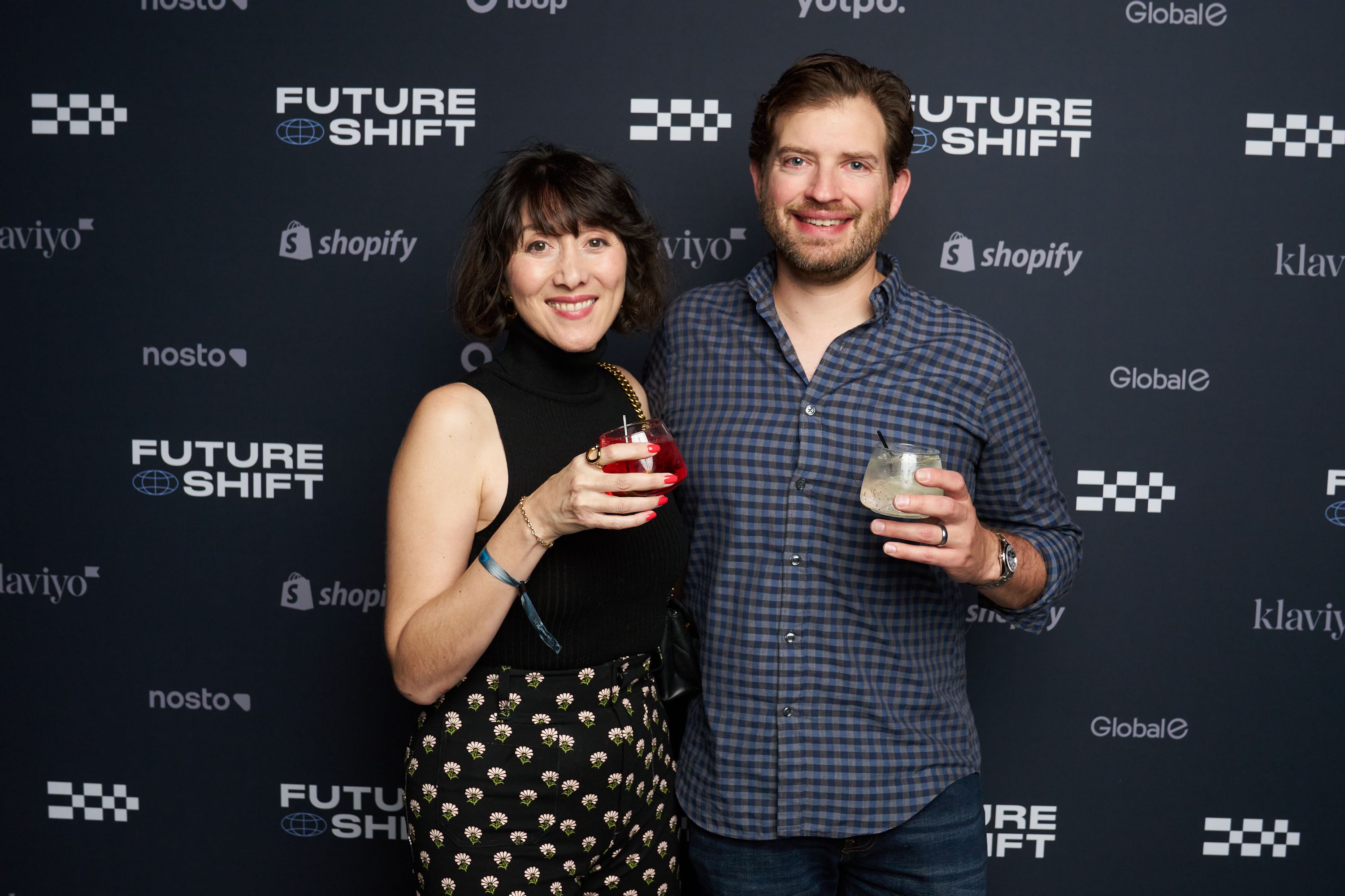 Guests in front of our step & repeat
