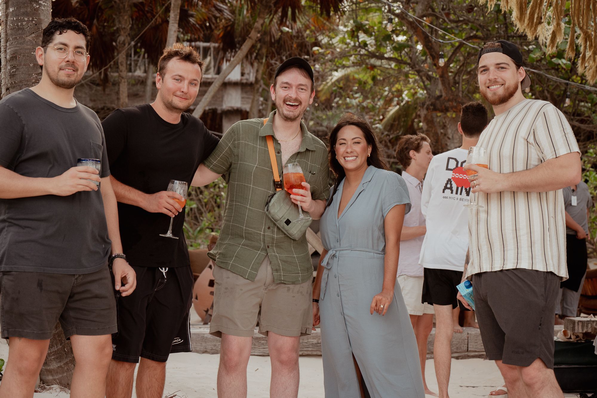 Domaine team members hanging out on the beach