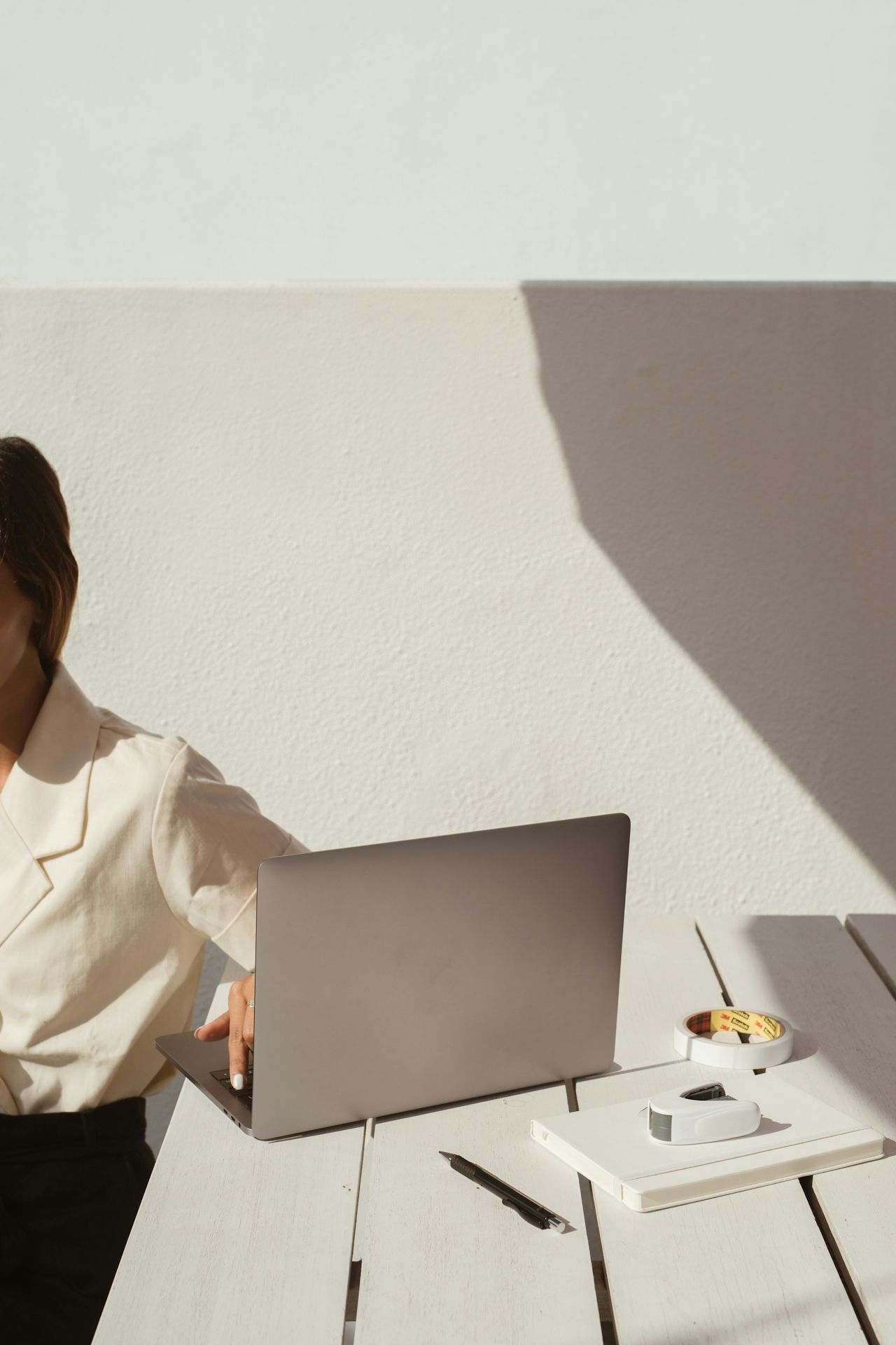 person sat with laptop