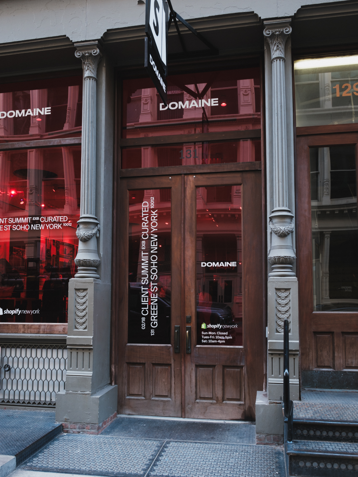 Facade of Shopify New York featuring Domaine's Curated Summit branding