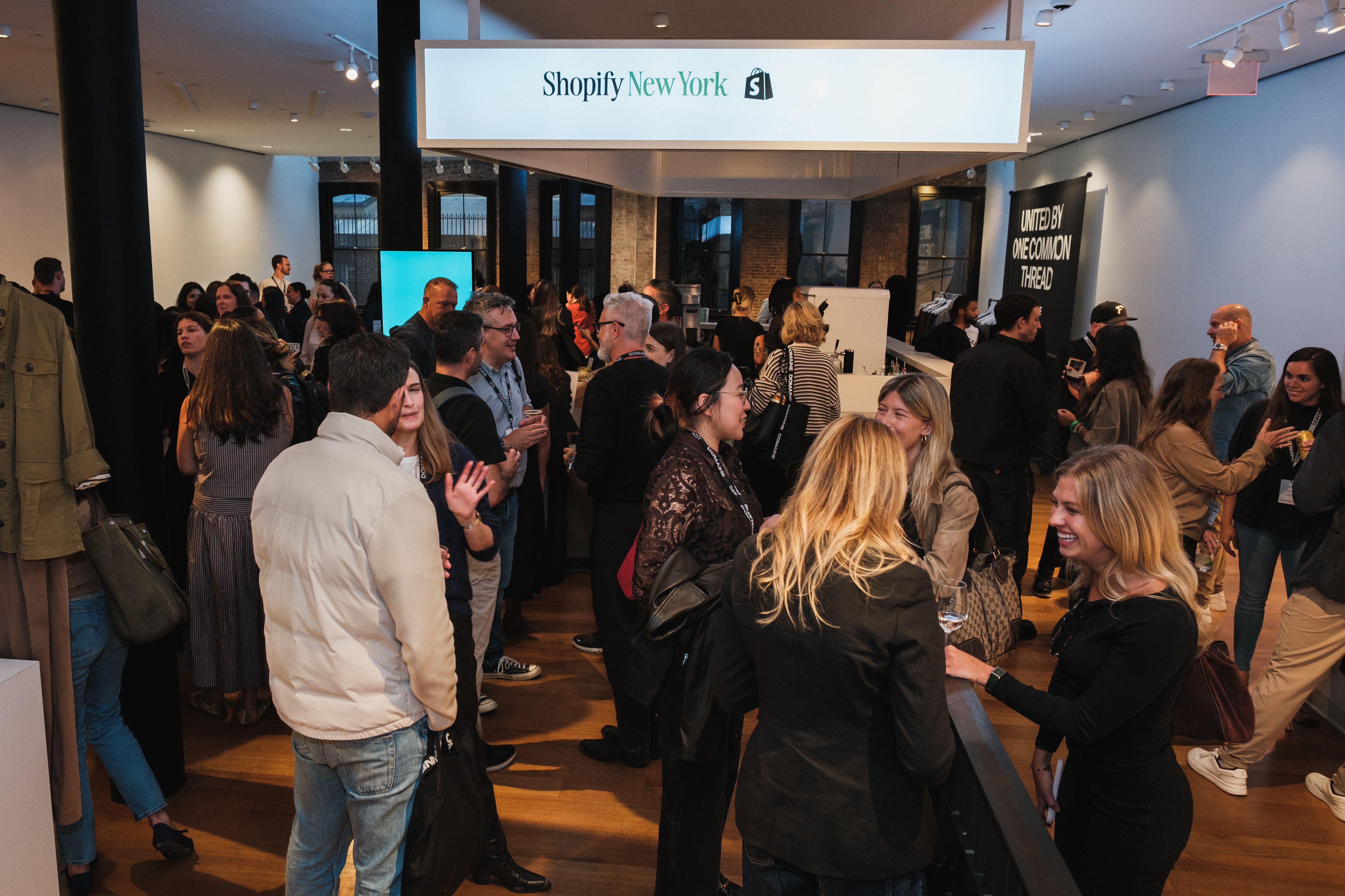 shopify space with people walking around