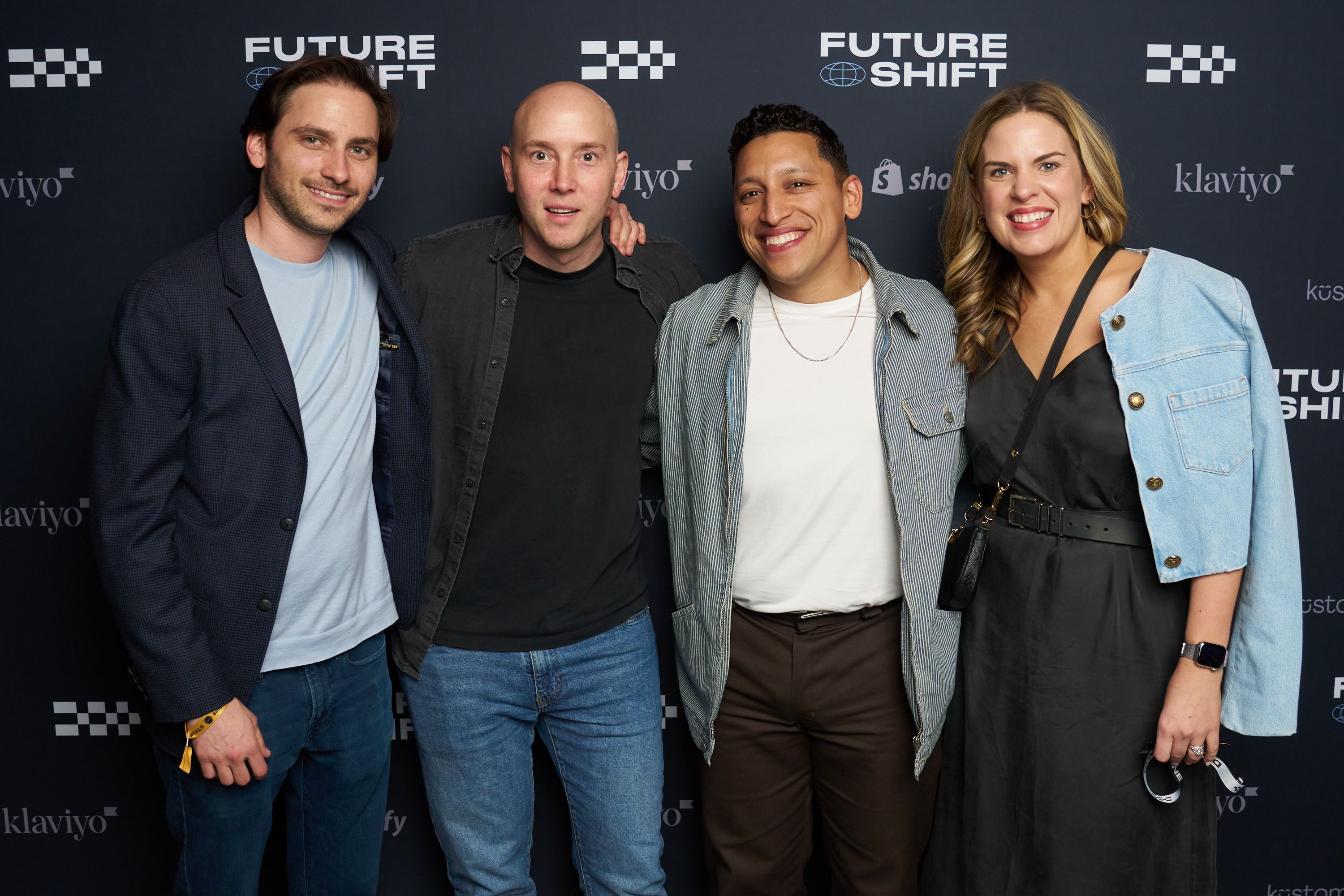 Guests in front of our step & repeat