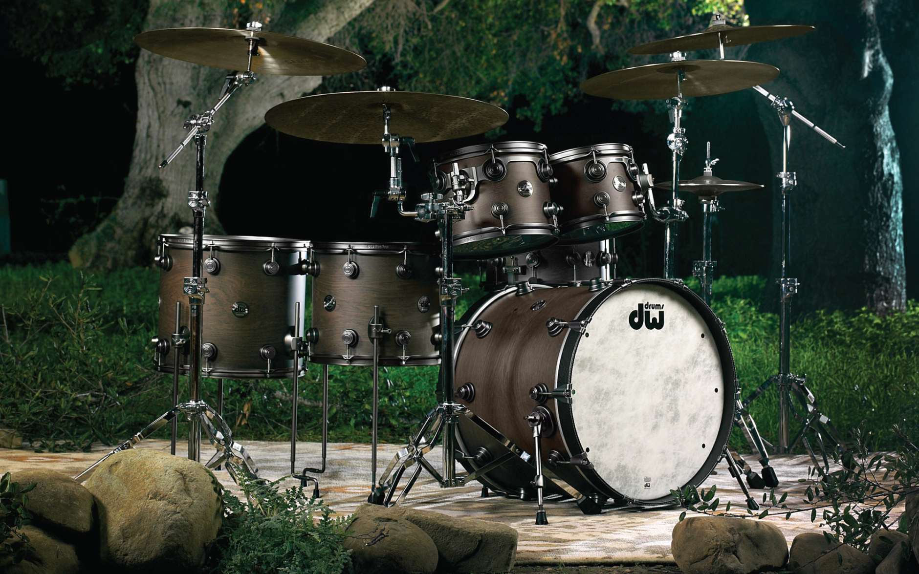 DW Drums drum kit, in a forest setting