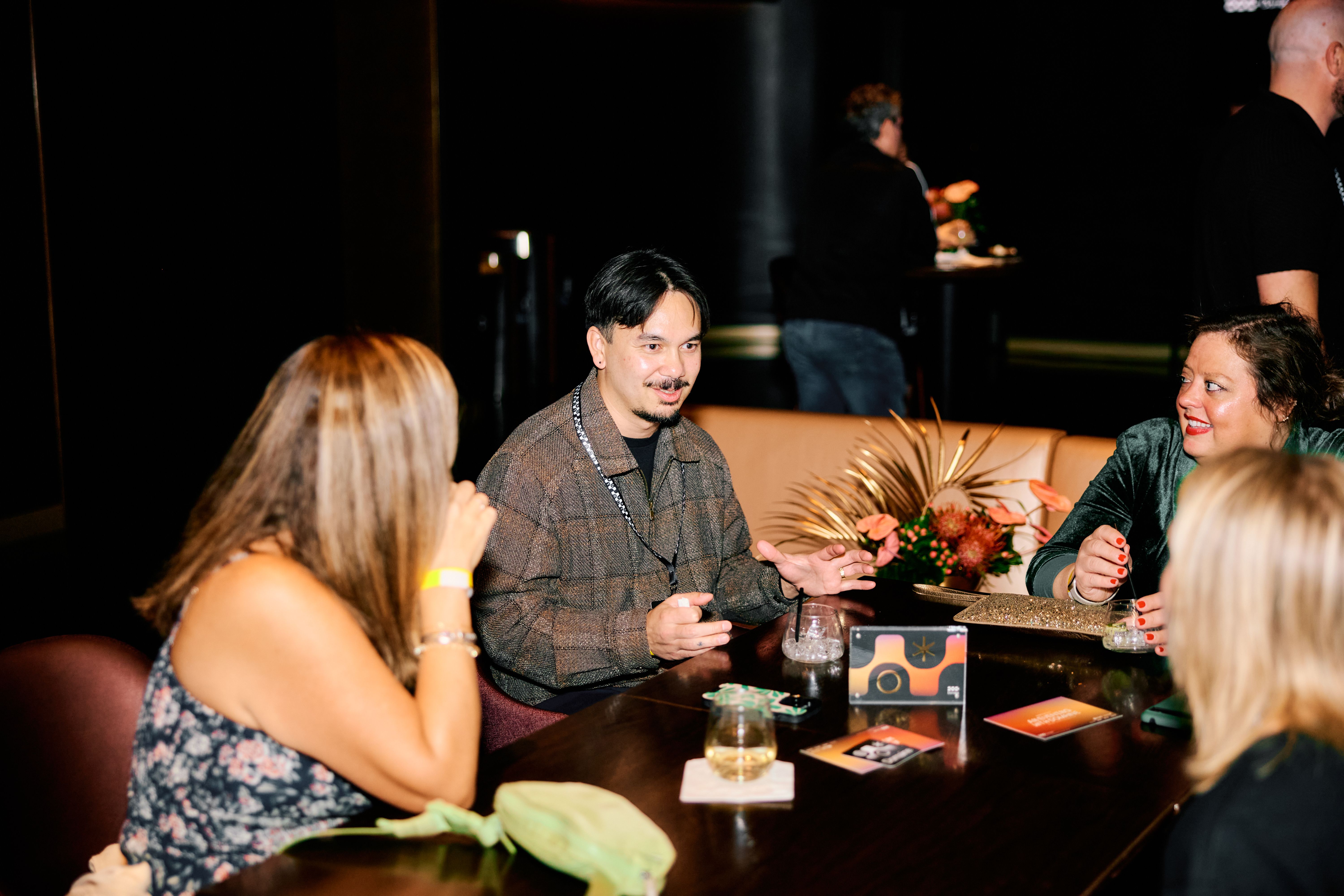 Guests enjoying the event in the Theory Lounge at the Las Vegas Sphere