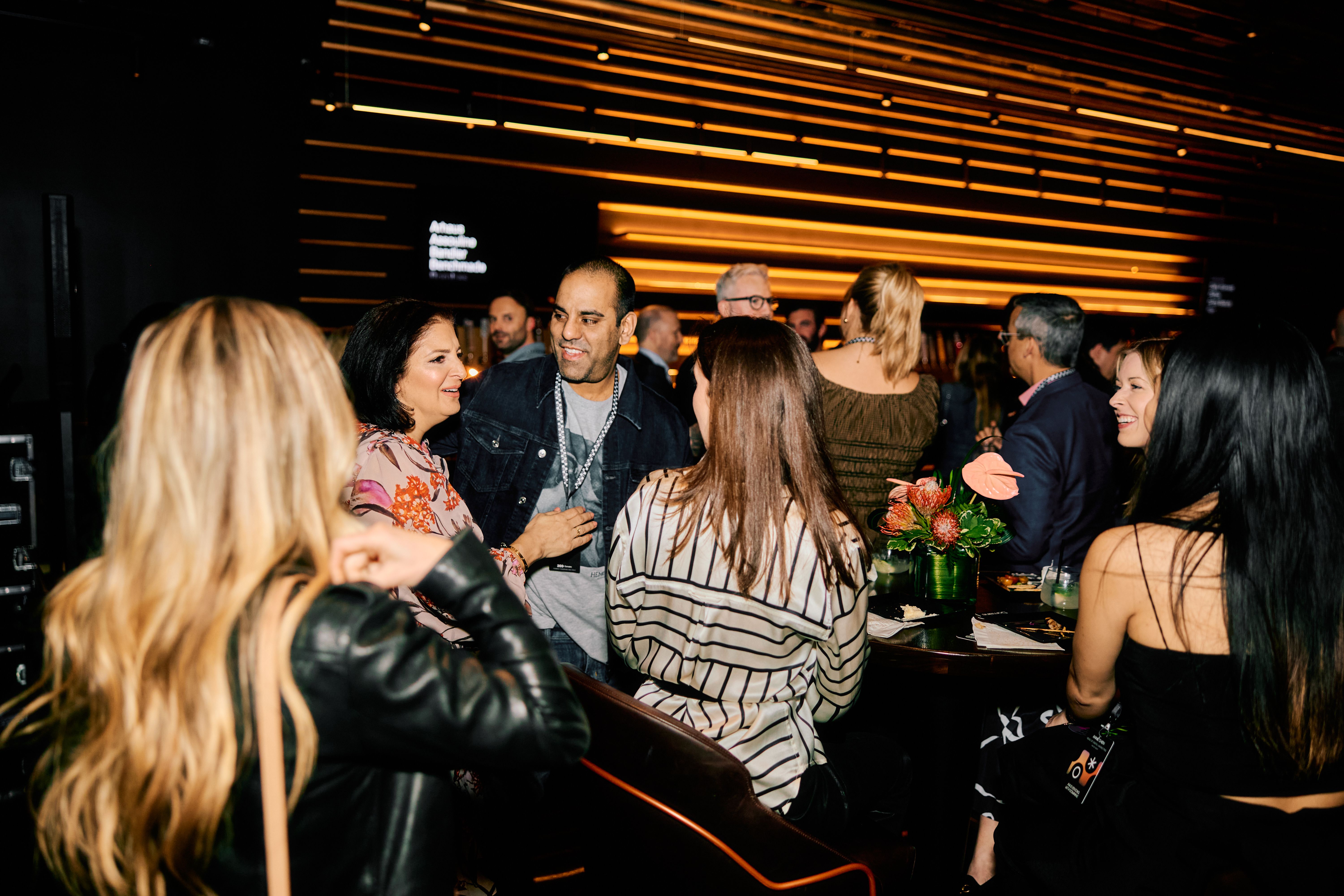 Guests enjoying the event in the Theory Lounge at the Las Vegas Sphere