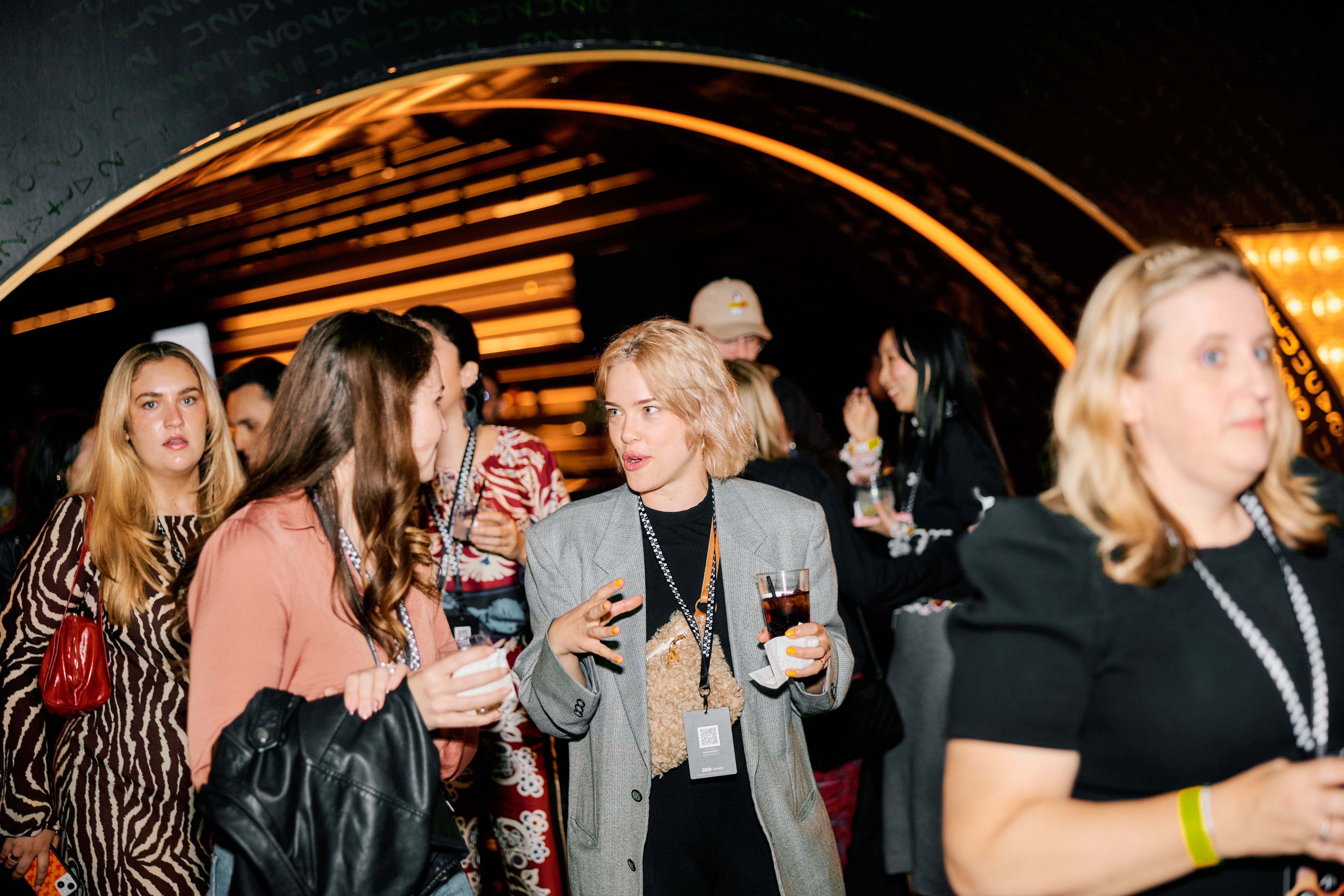 Attendees of the event speaking at the Sphere
