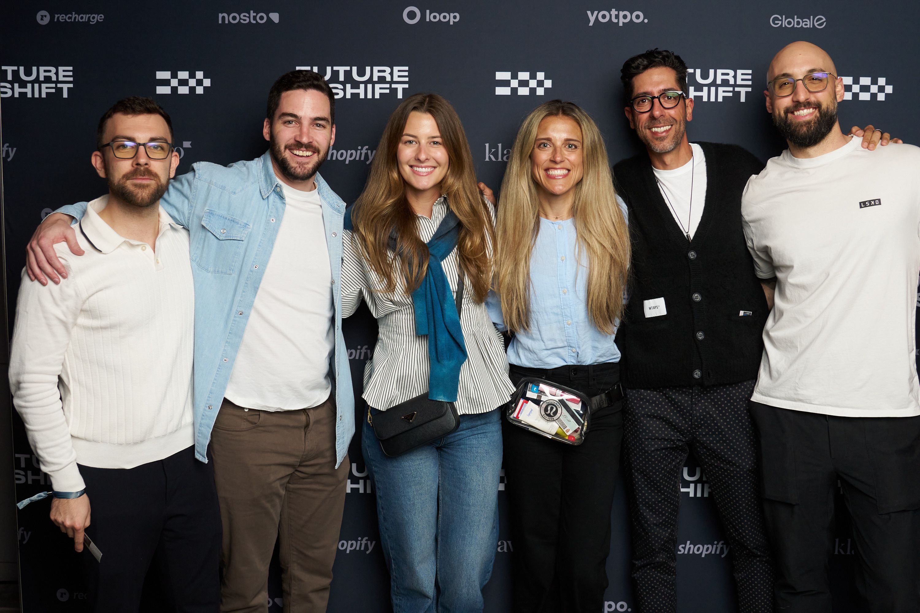 Guests in front of our step & repeat