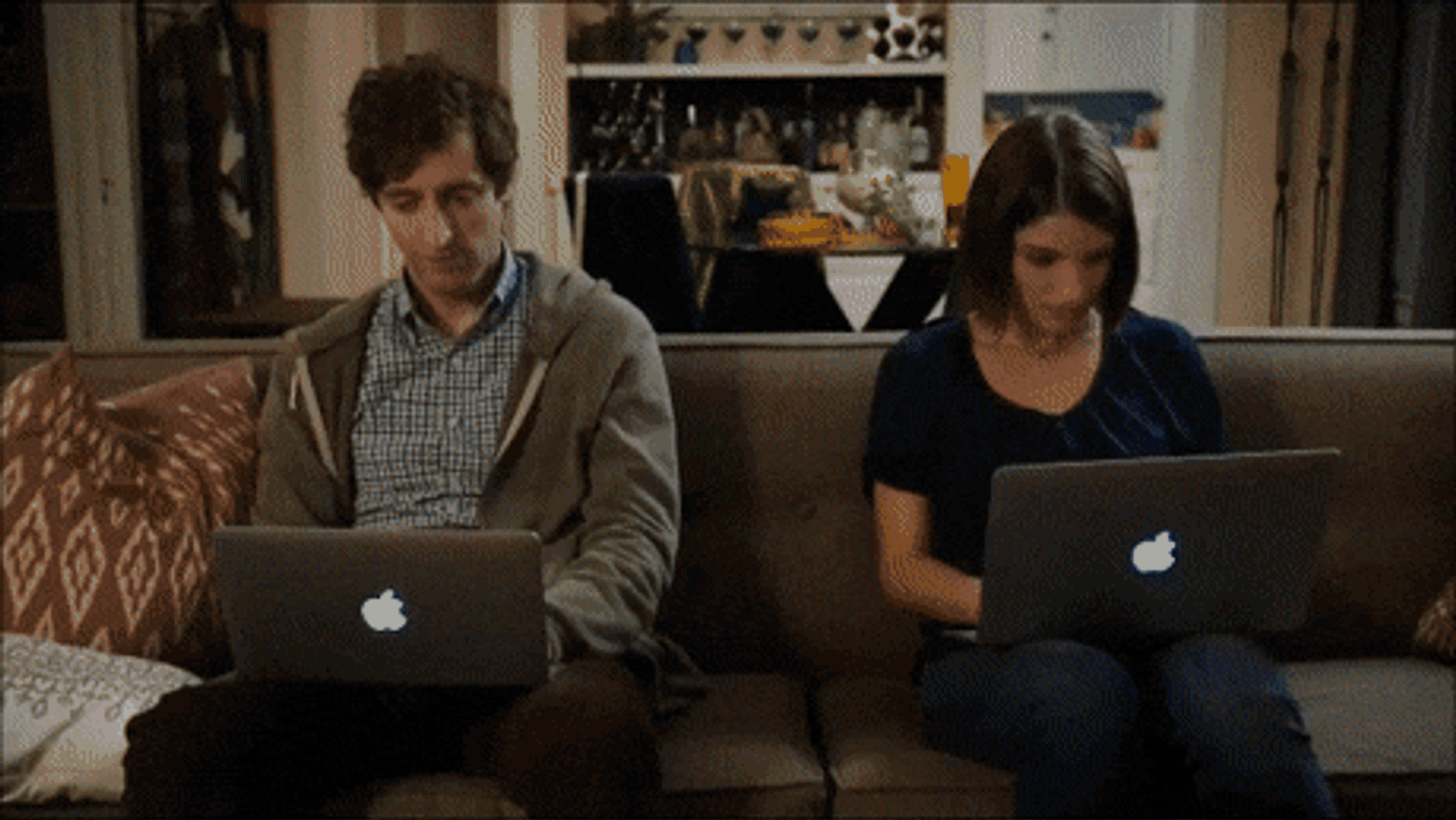 GIF showing a man typing on his laptop