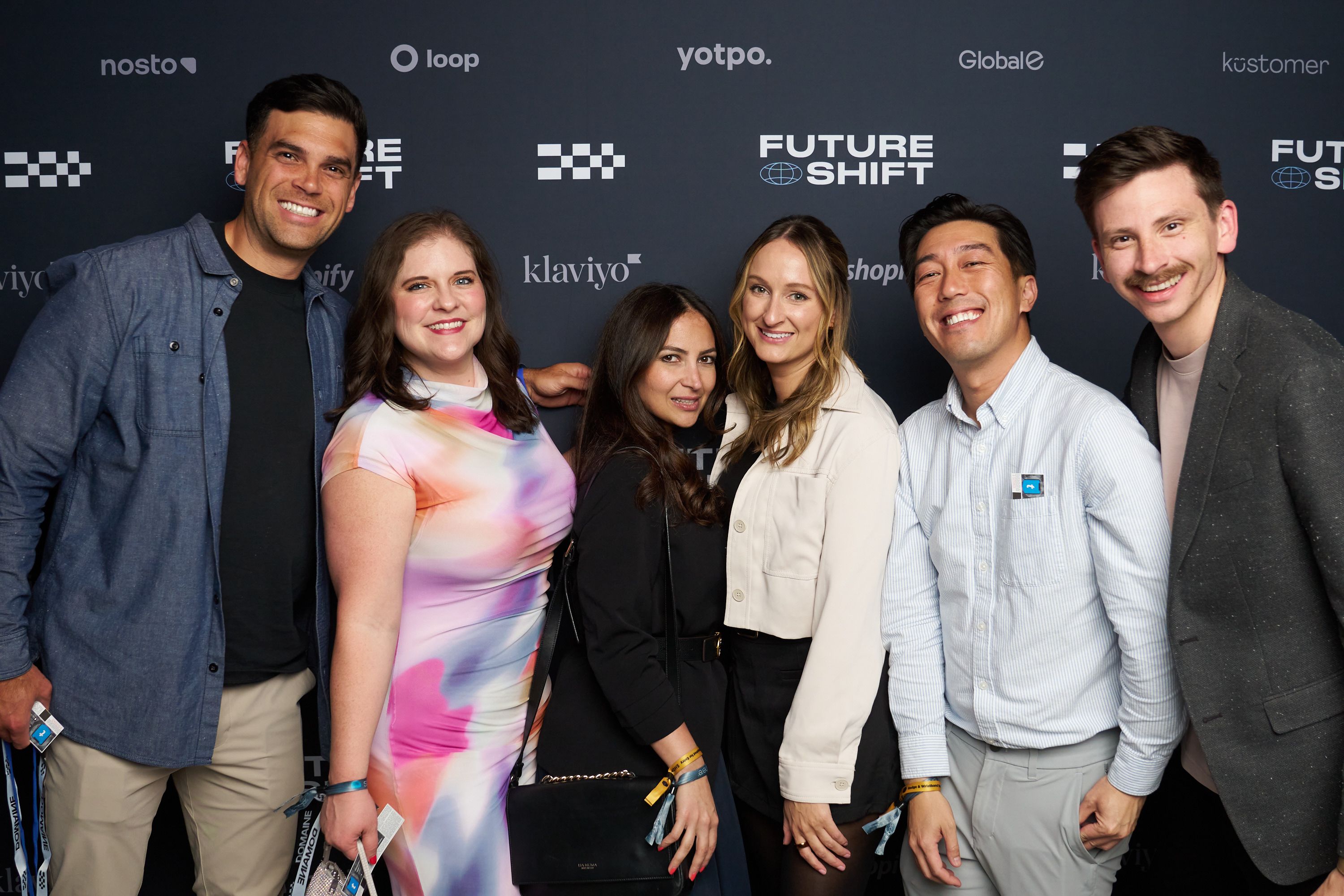 Guests in front of our step & repeat