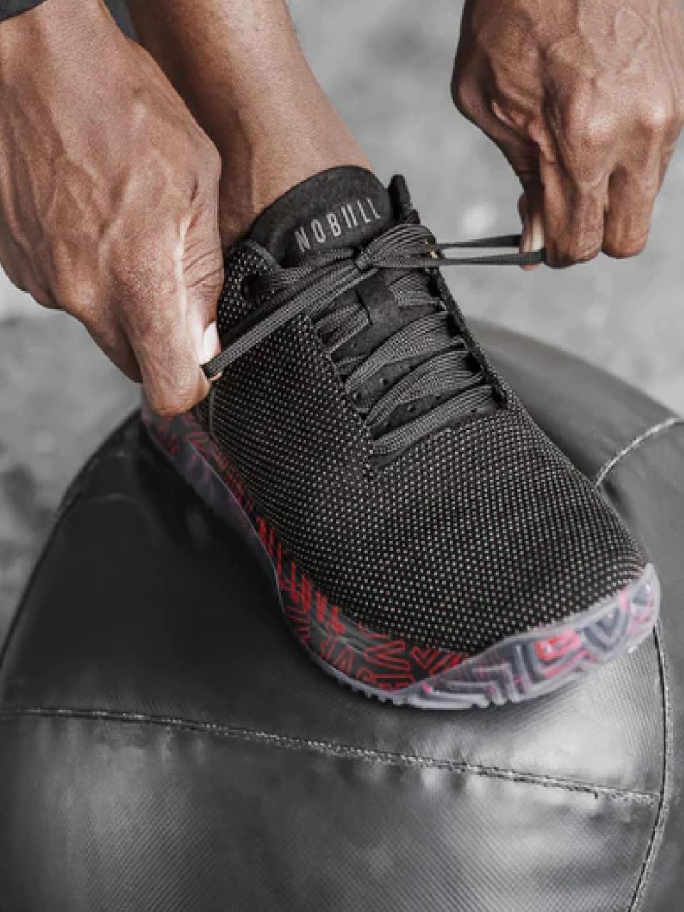 Person tying their Nobull laces