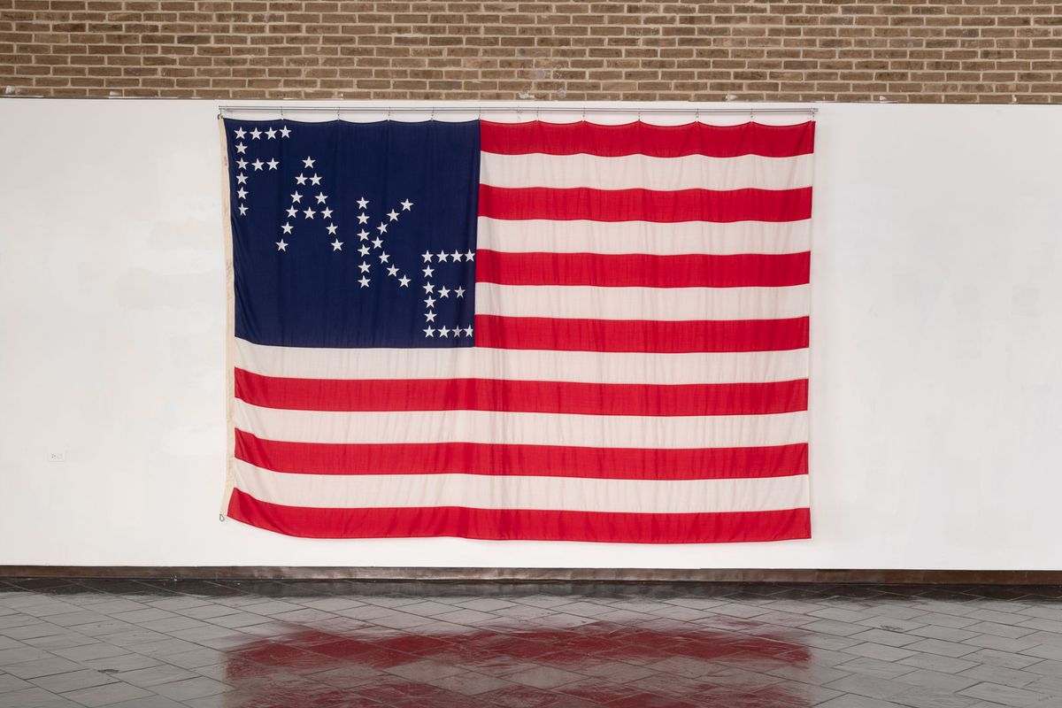 Daniel Bejar's Rec-elections (False Flag), an 8- by 12-foot American flag based on Abraham Lincoln’s 1864 re-election campaign banner