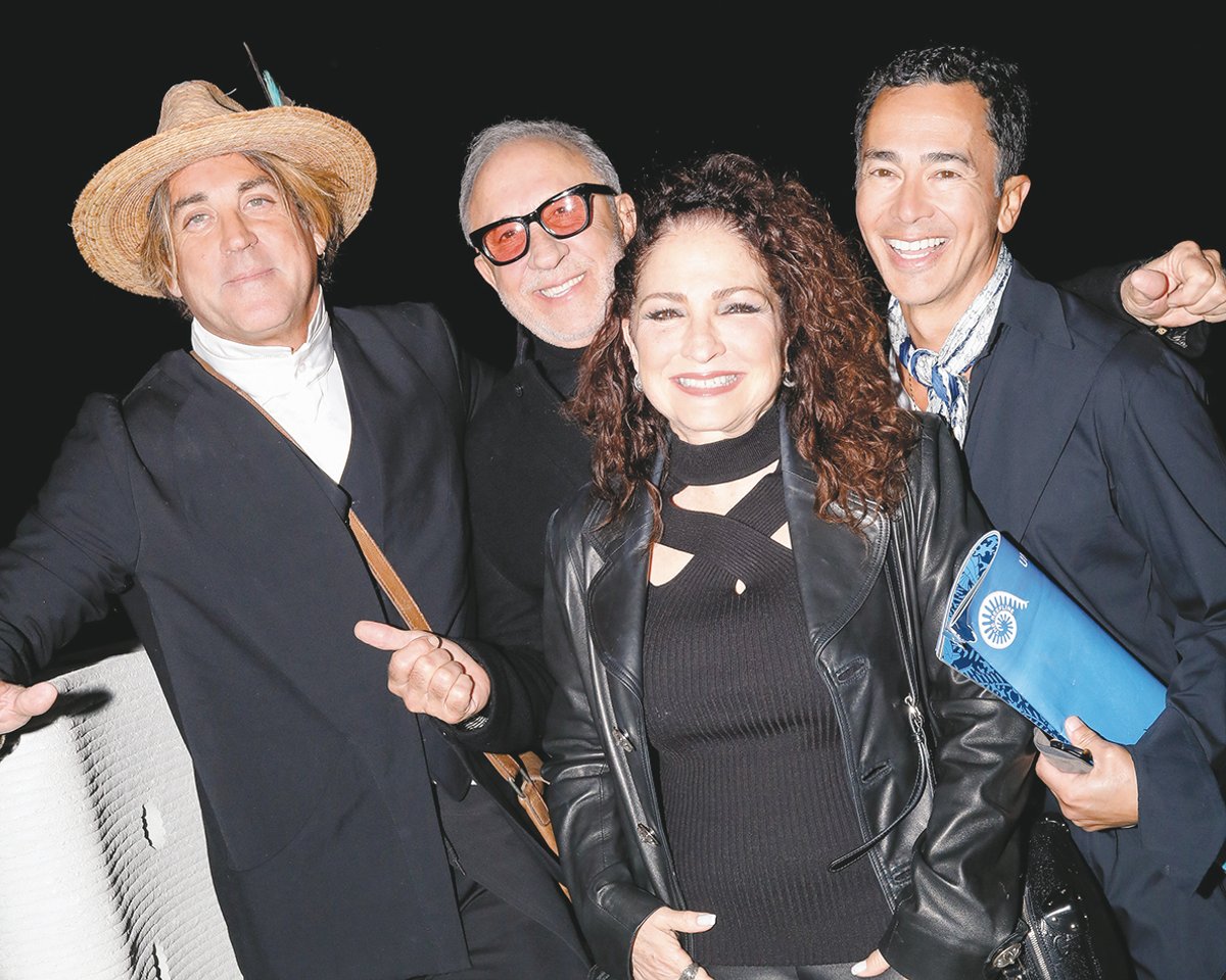 Life of the party: Emilio and Gloria Estefan (centre), flanked by artists Carlos Betancourt (left) and Alberto Latorre (right), at the Star Compass launch
Matt Borkowski/BFA.com