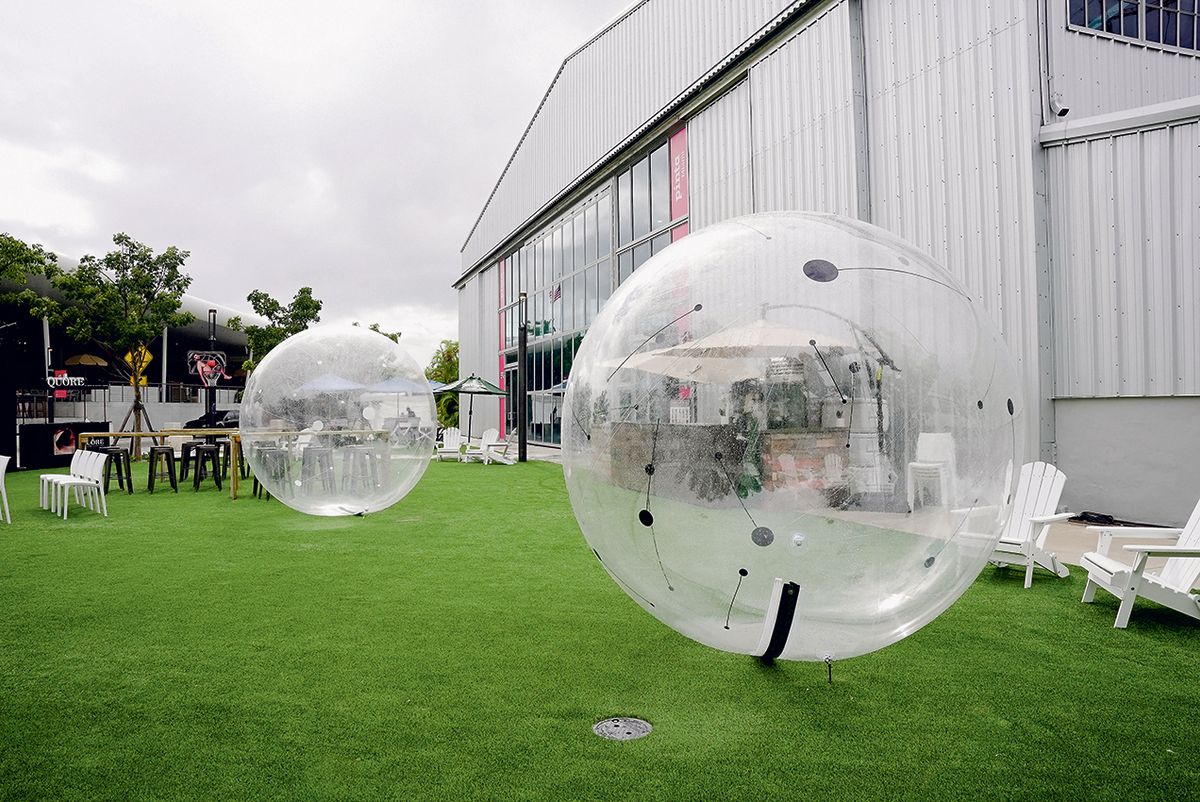 Sculptures by Carlos Medina, part of his Neutrino Spheres series, which the Venezuelan artist describes as “huge dew drops”, sit outside the Pinta art fair Courtesy of Pinta Miami fair
