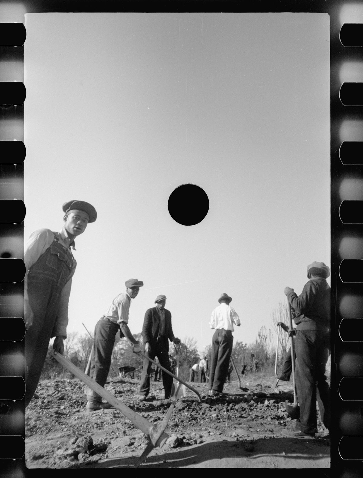 A photograph by Carl Mydans, possibly related to transients clearing land in Prince George's County, Maryland, November, 1935 Library of Congress, Prints & Photographs Division