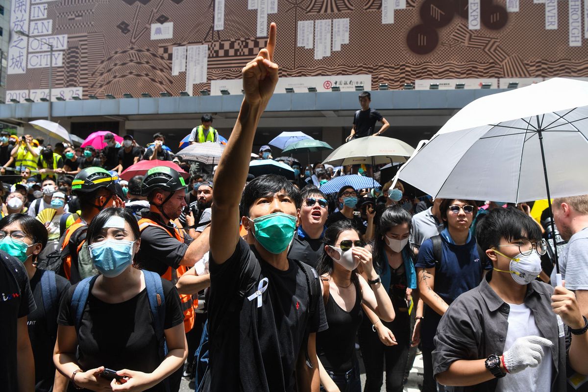 Thousands of protesters surrounded the police headquarters in Hong Kong today, calling for an extradition bill to be scrapped © Anthony Wallace/AFP/Getty Images