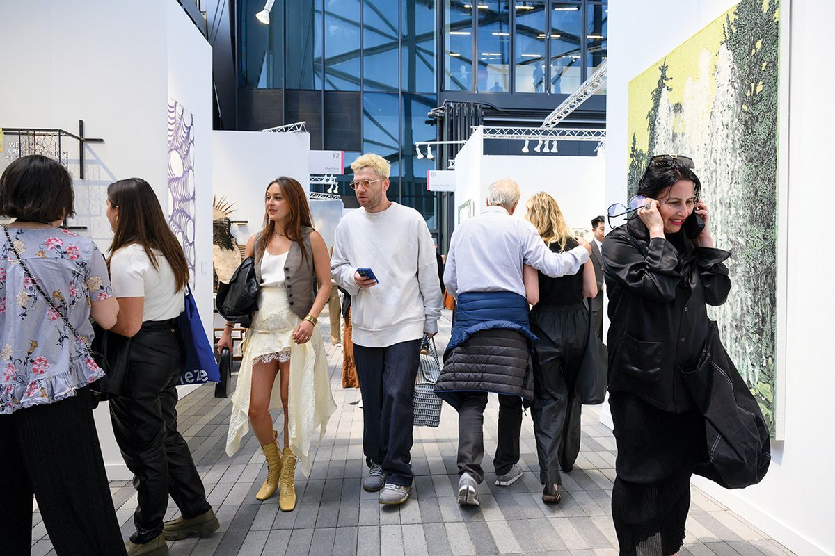 Attendees browse the stands at Frieze New York. Courtesy Frieze
