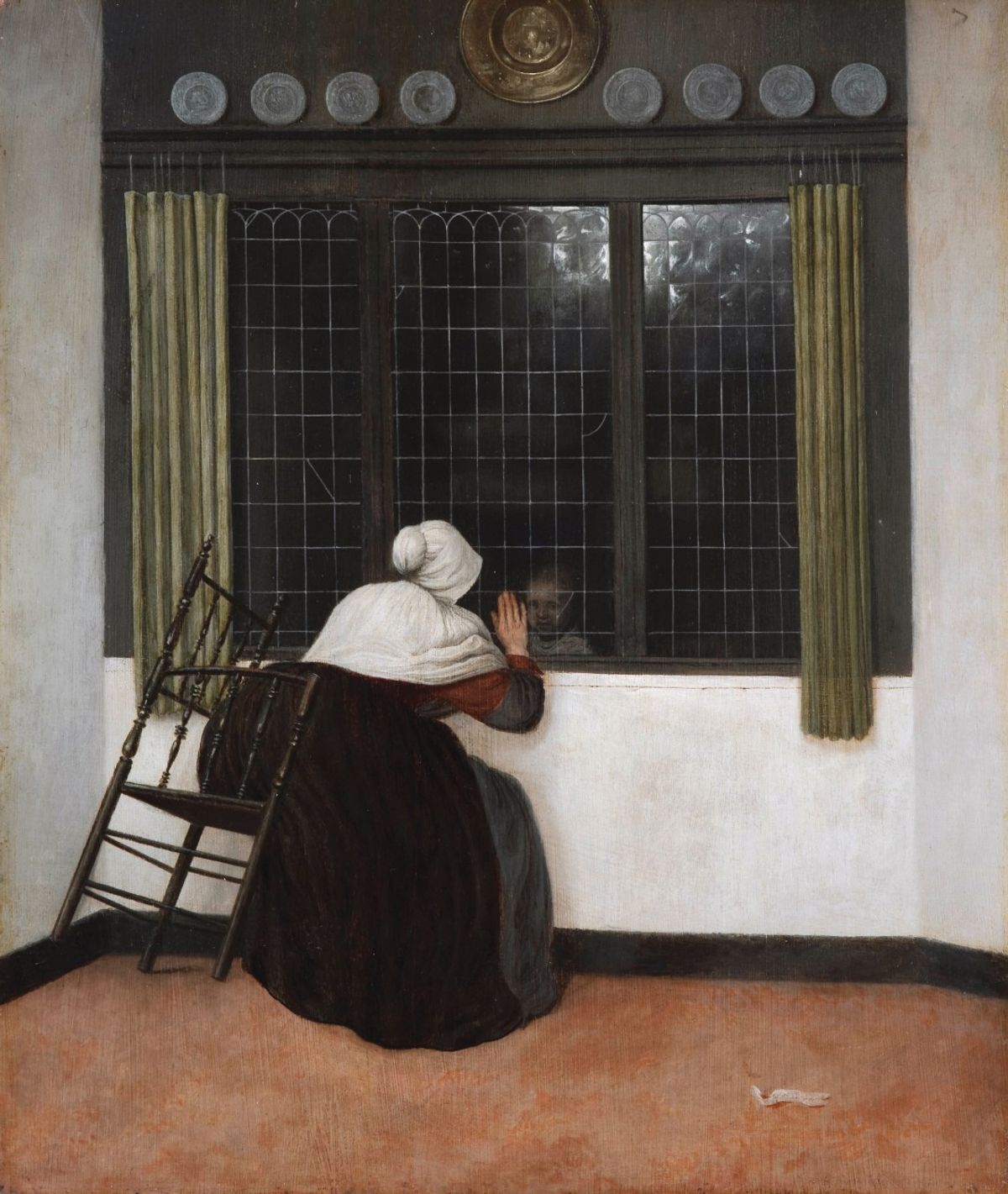 Vrel’s work focuses on enigmatic characters, as in Seated Woman looking at a Child through a Window (after 1656) Fondation Custodia