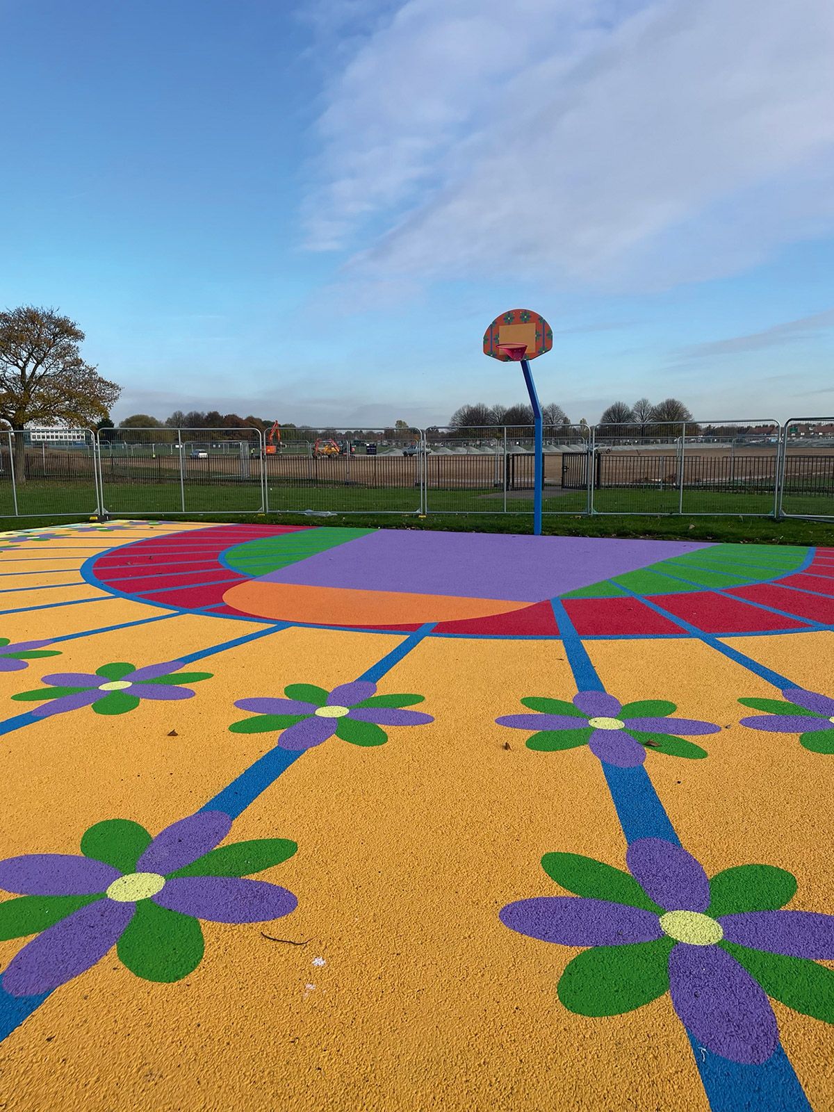 Playing with colour: a basketball court , part of Yinka Ilori’s The Flamboyance of Flamingos playground in Dagenham, East London Photos and design: the artist