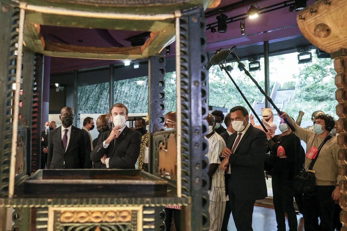President Macron at the Musée du Quai Branly-Jacques Chirac in 2021, where 26 treasures looted from Benin went on show for five days before being returned to the West African country

Abaca Press/Alamy Stock Photo



