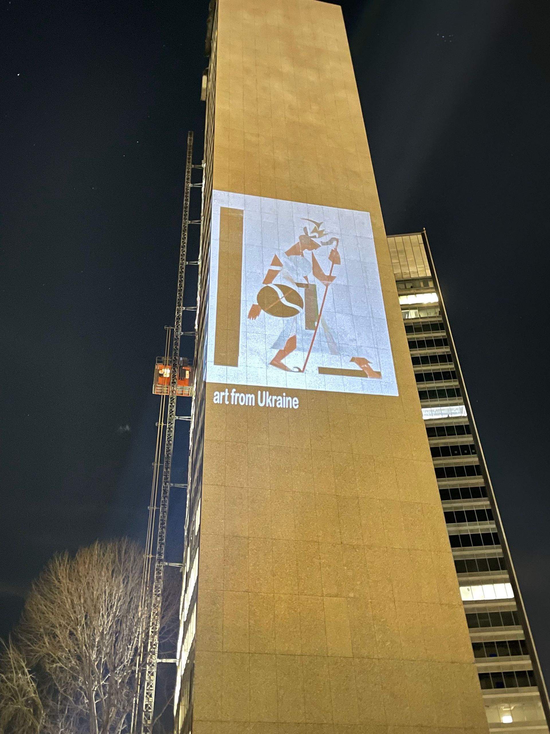 A Justice Murals projection in Oakland featuring a work by Anatol Petrytsky Courtesy Justice Murals