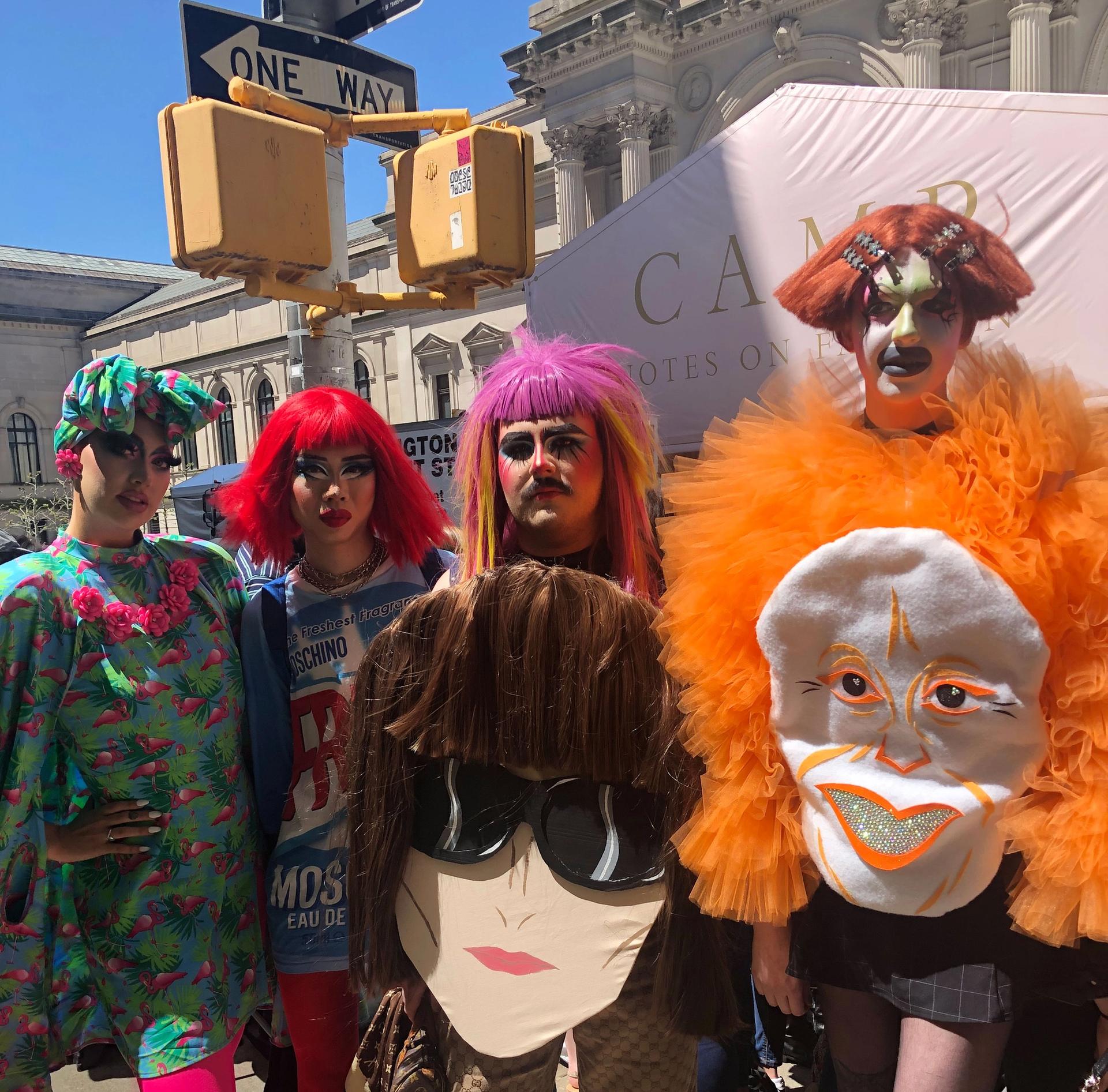 Four friends who took a bus down from Toronto had the best lewks among the onlookers Photo: Victoria Stapley-Brown