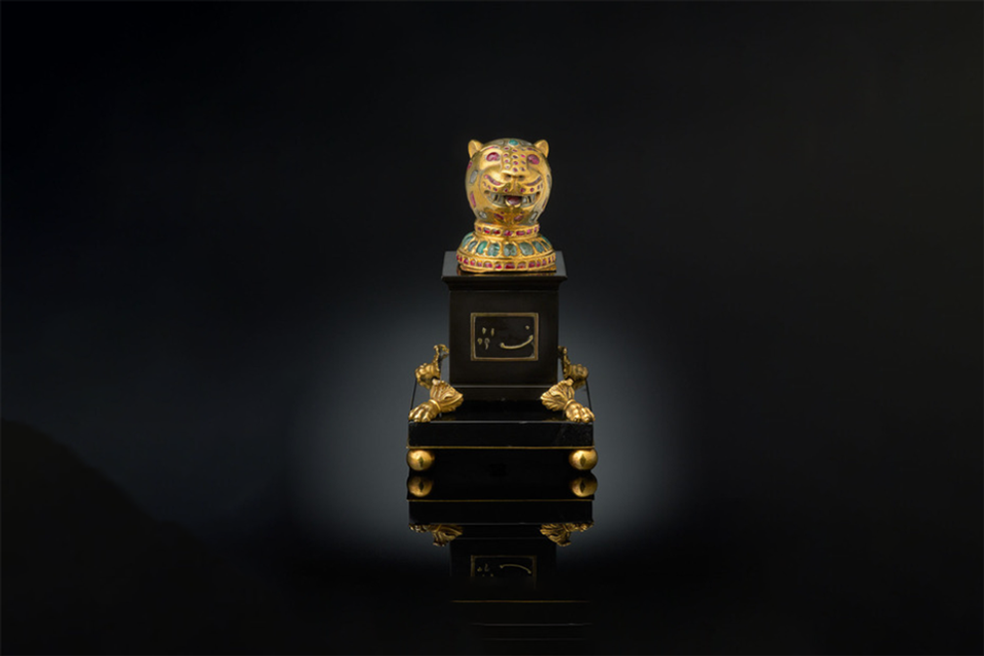 The jewel-encrusted gold tiger's head finial

Courtesy of DCMS