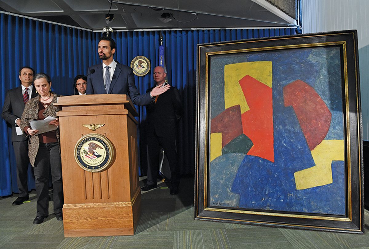 Brazil's secretary of justice with a painting believed to have been smuggled into the US by Edemar Cid Ferreira ©Stan Honda/Getty Images