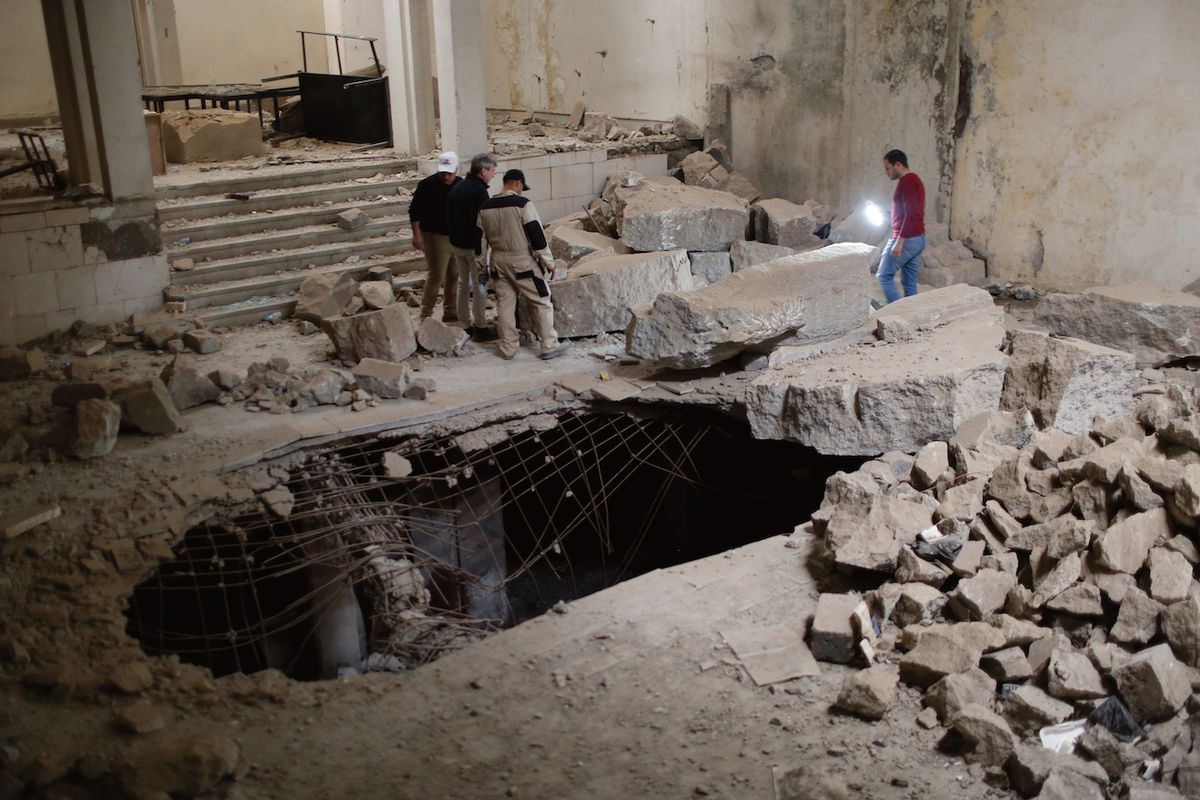 Assessing the damage: Isis blew up a carved platform in the museum’s Assyrian Hall, leaving an enormous crater Sebastian Meyer/Smithsonian Institution