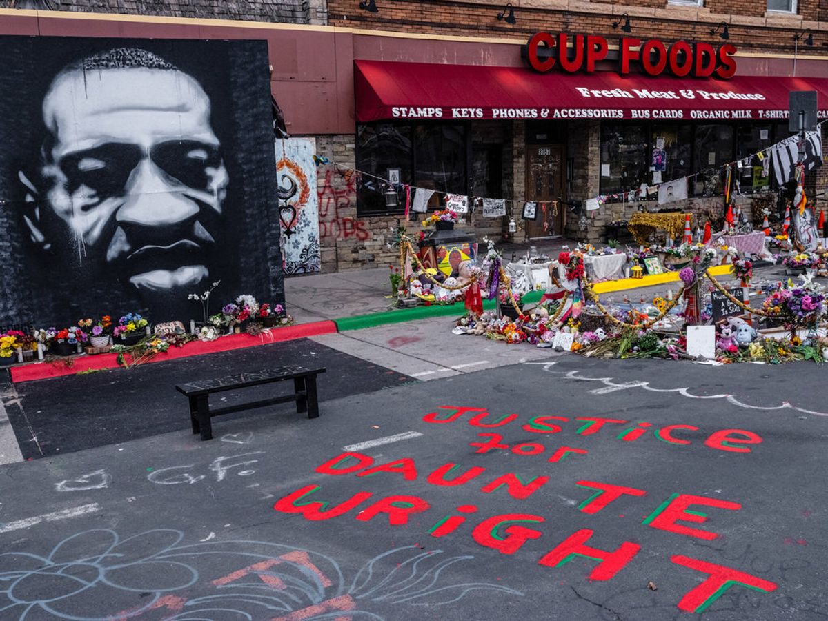 "Justice for Daunte Wright" is written on the street outside of Cup Foods, where George Floyd was murdered and a community-built memorial has taken over the intersection Courtesy of the George Floyd and Anti-Racist Street Art database