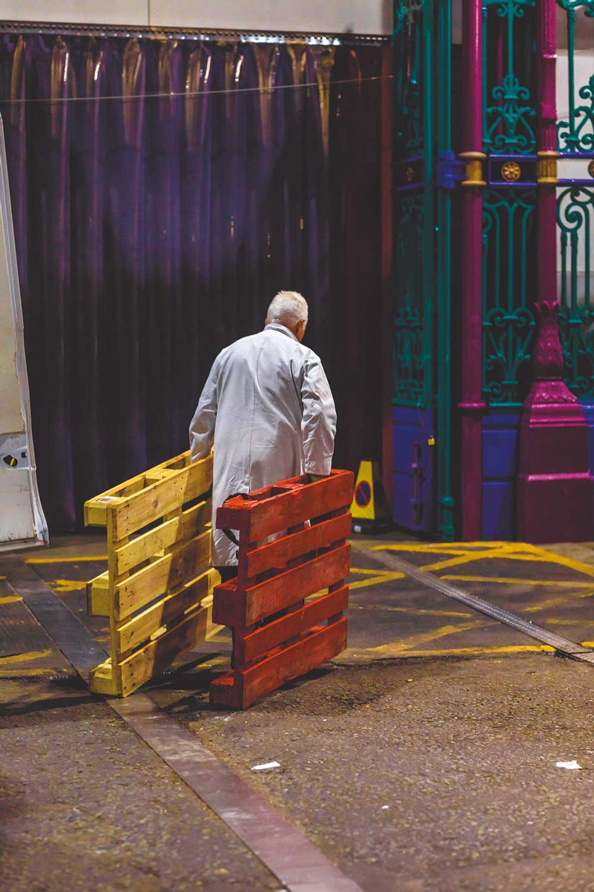 A worker at the London Central Markets, the largest wholesale meat market in Europe, which occupies the eastern end of the Smithfield site. Smithfield will house, at its western end, the new Museum of London, in long-derelict 19th-century former market buildings Shane Aurousseau/Alamy Stock Photo