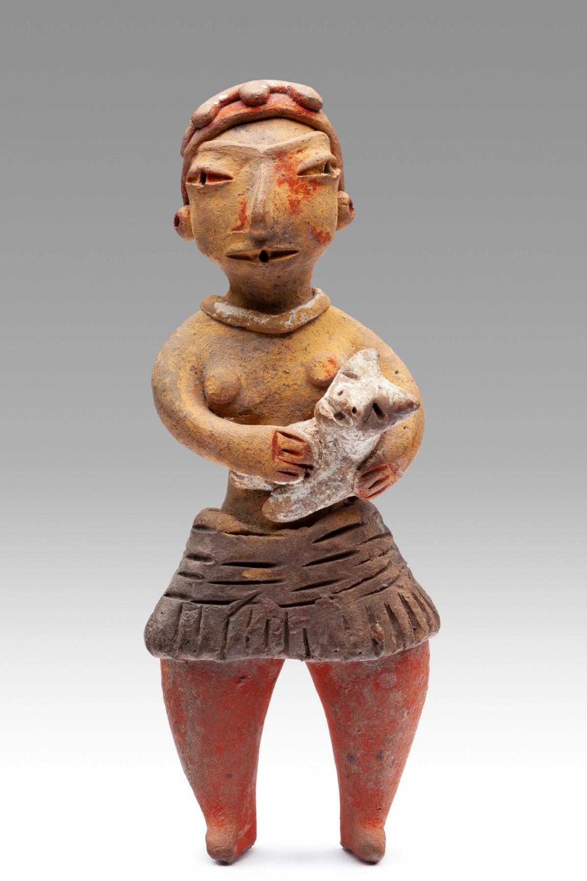 Figurine Carrying a Dog from Tlatilco, Mexico (1200-400BC), which features in We Live in Painting: The Nature of Colour in Mesoamerican Art Museo Nacional de Antropología, México / Inah-Canon