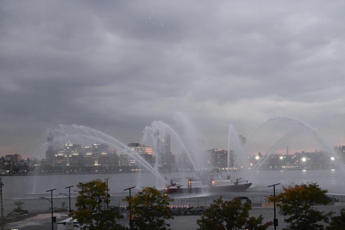 Presentation on the Hudson River by the Fire Department of New York City ’s Marine Company 9 and their fireboat the Fire Fighter II  during the groundbreaking for David Hammons's Day’s End