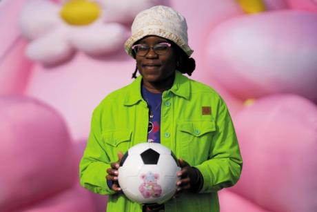  Artist and the local football club help fairgoers with soccer skills at Frieze Los Angeles 