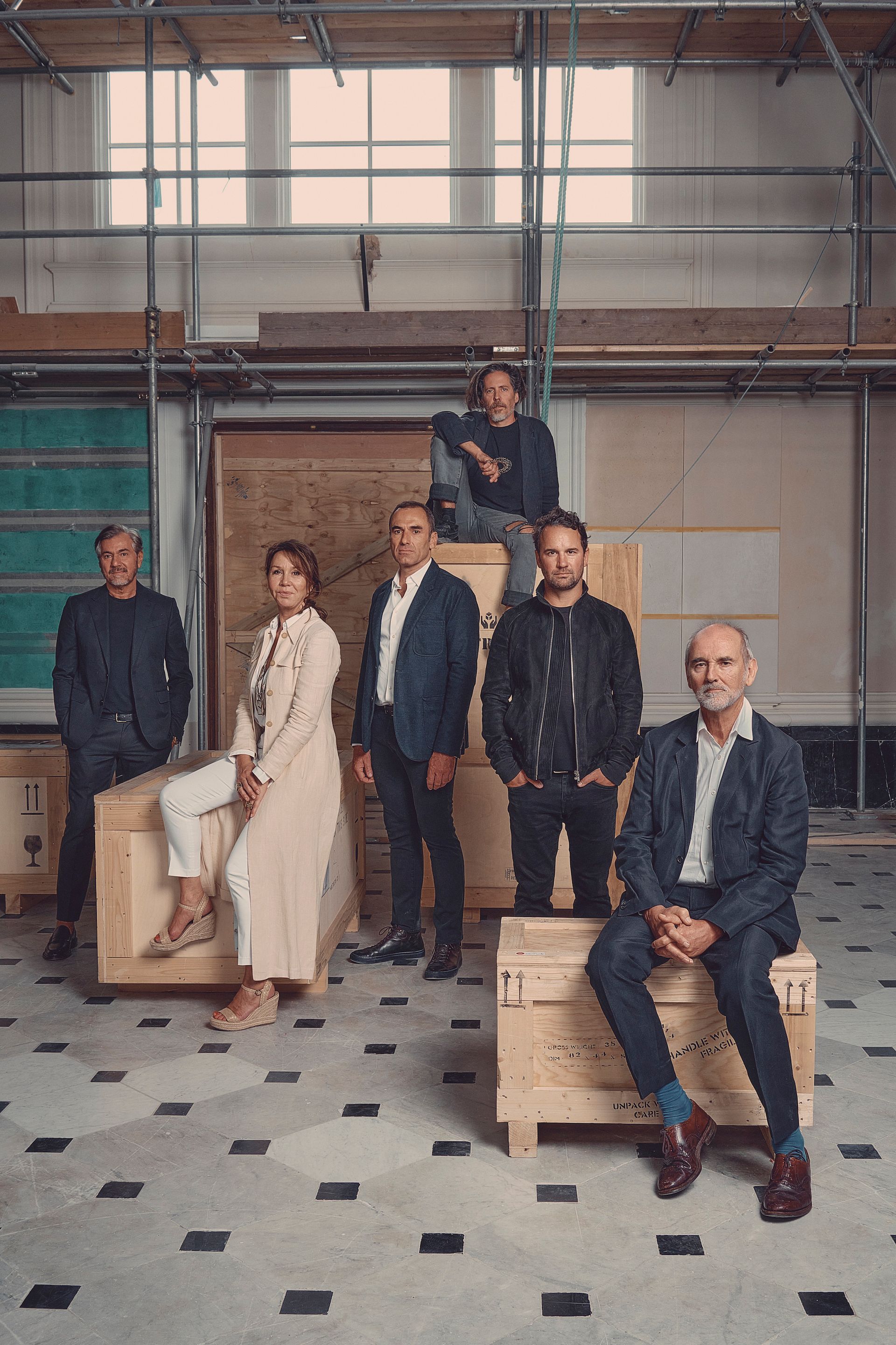Members of the Carpenters Workshop Gallery team, including at top: Nacho Carbonell; middle row, left to right: Vincenzo De Cotiis, Ingrid Donat, Loïc Le Gaillard, Julien Lombrail; foreground: Christopher Le Brun. Courtesy of Ladbroke Hall and Carpenters Workshop Gallery. Photo by Tom Jamieson.