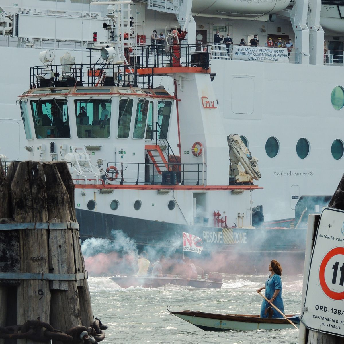 Jane da Mosto protests as the MSC Orchestra sails into Venice in June, the first cruise ship to visit the city since the pandemic struck Michele Gallucci (@sailordreamer78)