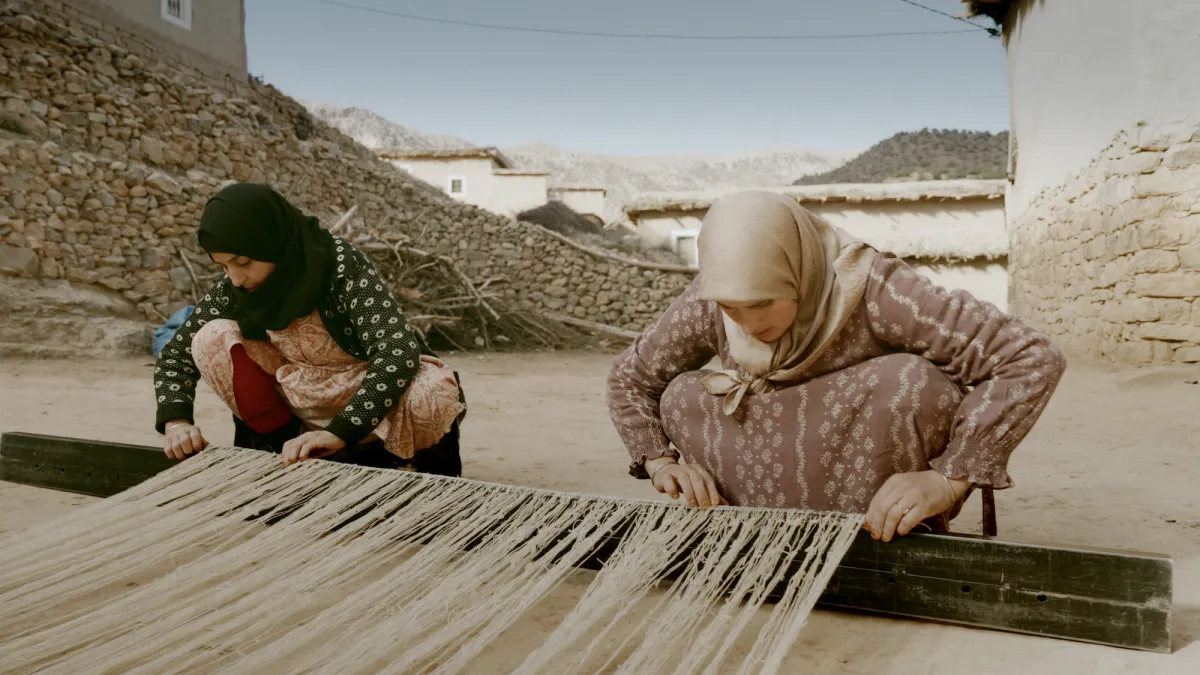 Film still from Handmade Future (2026), showing women rugmakers in Morocco