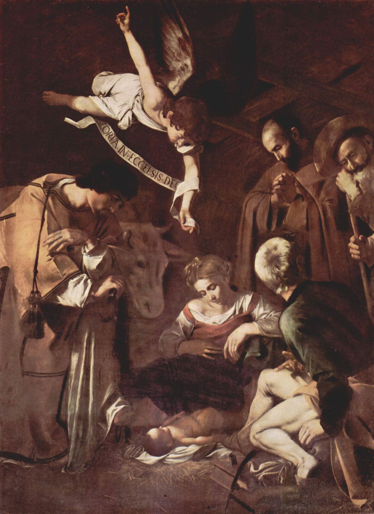 Caravaggio, Nativity with St. Francis and St. Lawrence (1600) Wikimedia Commons