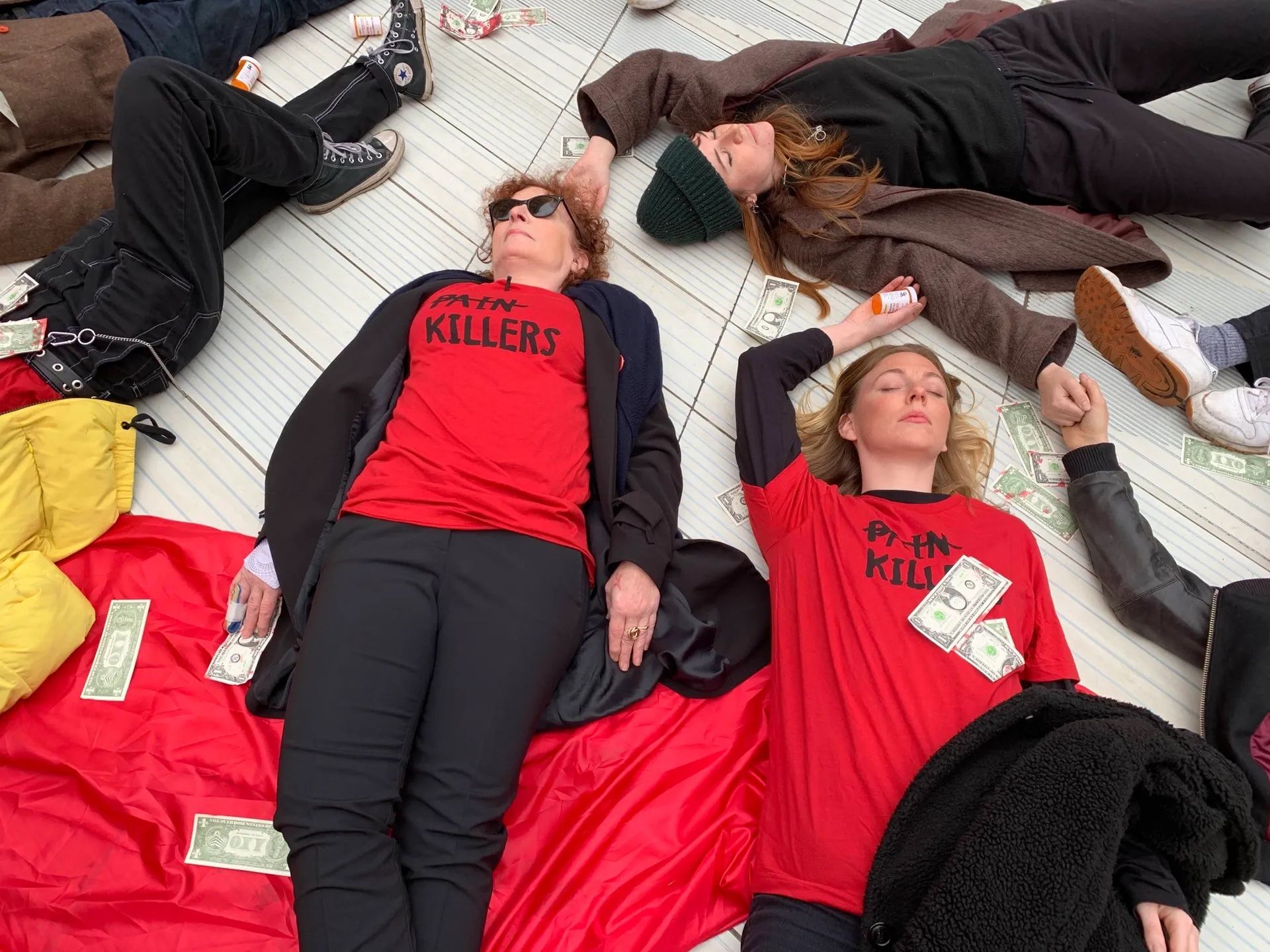 Nan Goldin during a "die-in" protest at the Victoria and Albert Museum in London in 2019 Gareth Harris