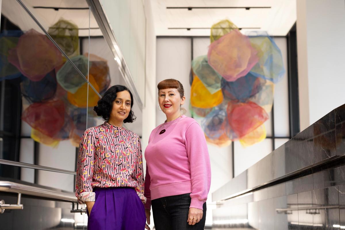Artist Rana Begum and Louise Evans, UBS Art Collection Regional Manager for UK, Northern Europe, the Middle East and Africa, in front of Begum's commission No. 1238 Mesh (2023) UBS Art Collection © Rana Begum. Courtesy the artist and Kate MacGarry Gallery London. Photo: David Parry
