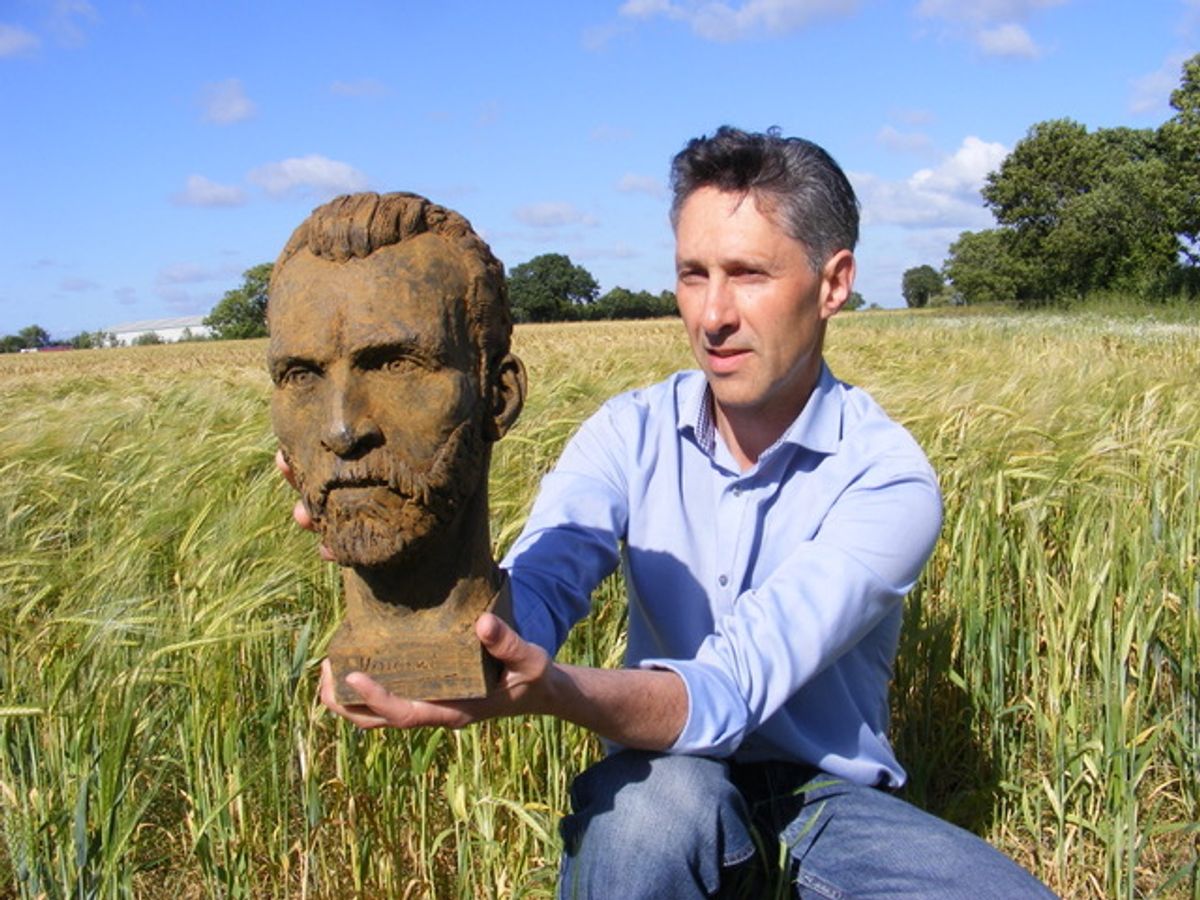 Anthony Padgett with his Van Gogh sculpture, photographed in a Lancashire wheatfield, 2018 