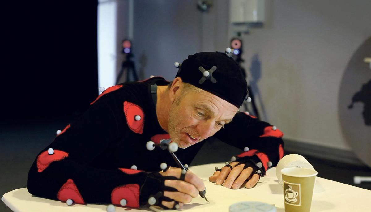 Albert Oehlen pictured during production of the virtual reality work, wearing a special suit with white VR markers on it Courtesy of the artist, VIVE Arts and MacInnes Studio