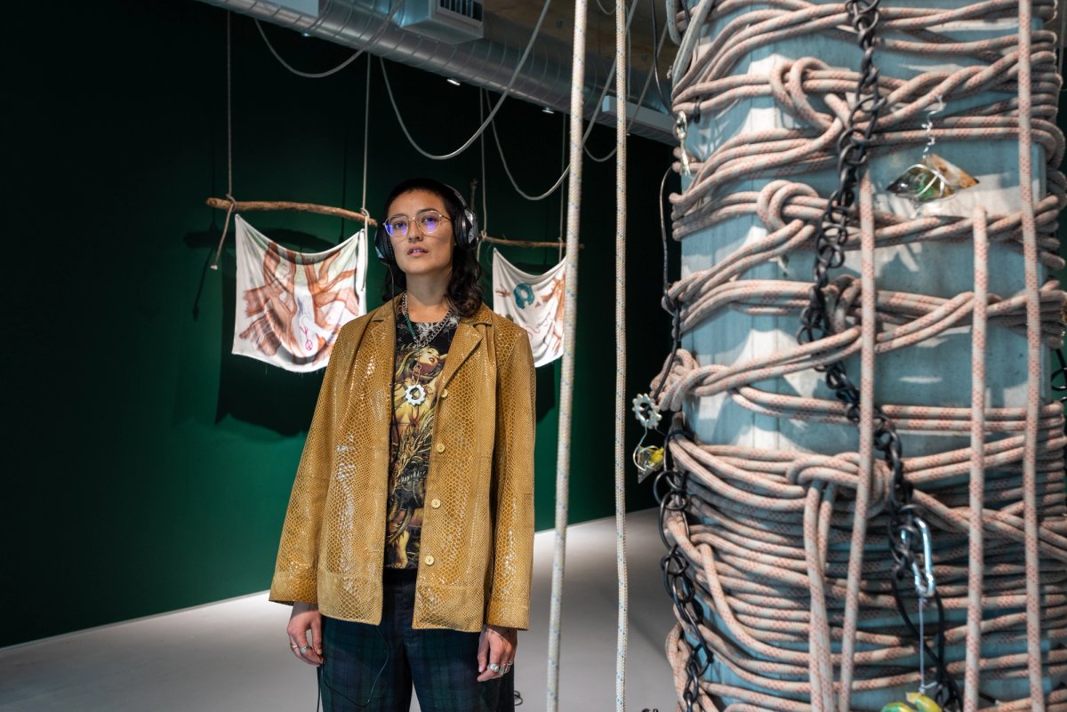 The artist Bones Tan Jones in the exhibition room forTunnel Visions © Deniz Guzel