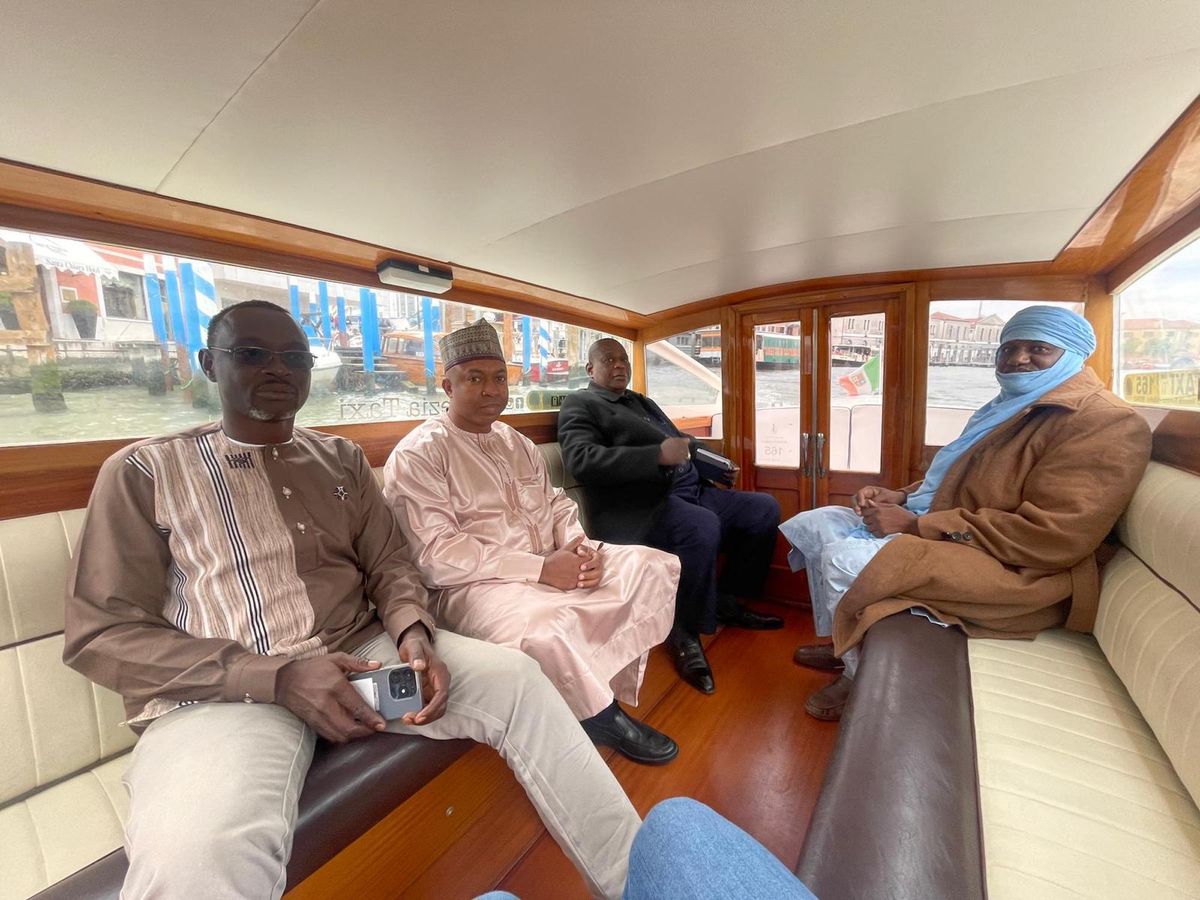 Souleymane Ibrahim (at left), commissioner of Niger's presentation at the 2023 Venice Biennale of architecture, and Mohamed Hamid (second from left), Niger's former Minister of Culture, Tourism and Crafts, with a Nigerien delegation in Venice last spring Courtesy the Pavillion of the Republic of Niger at the Venice Biennale