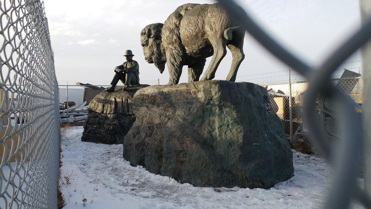Ken Lum's sculpture The Buffalo and the Buffalo Fur Trader (2016) in storage in a municipal lot in Edmonton, Alberta Courtesy the artist